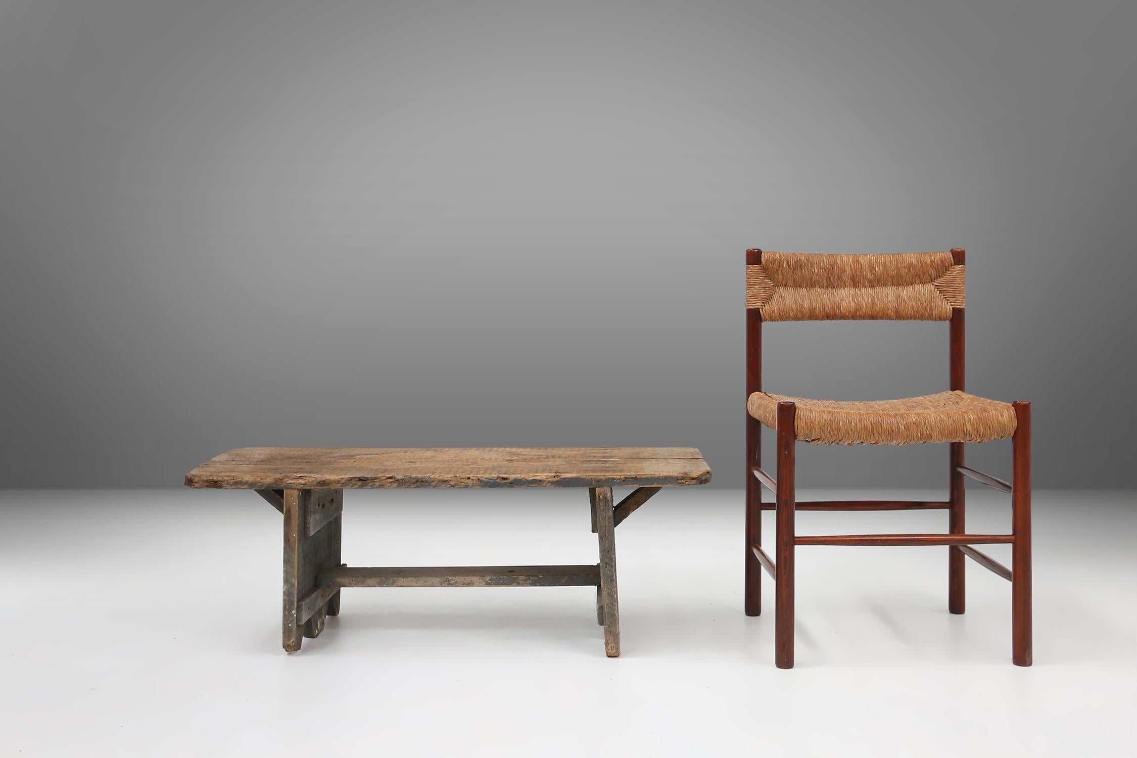 France / 1890 / bench / wood / rustic / mid-century / industrial

Rare wooden bench with genuine patina after many years of use. Made in France around 1890. With reinforcement beam and 2 legs with decorative recessed triangles and original grey