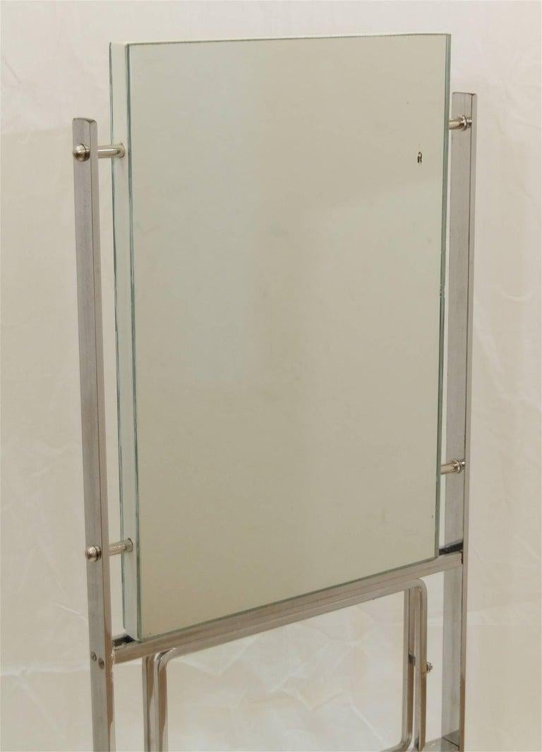 Large tabletop commercial department store mirror from the early 20th century, two mirrors supported on a wood frame mounted on a multi-part chrome frame.

Please see condition notes.