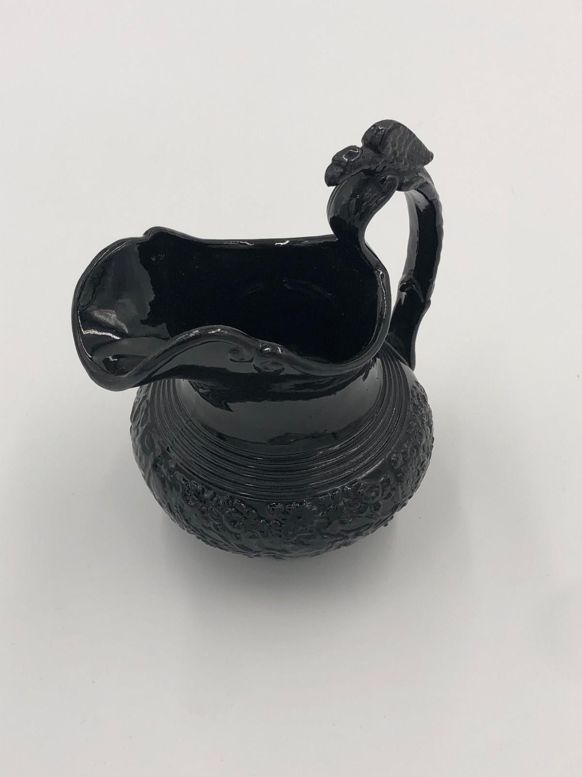 Unusual Antique Black Basalt Pottery Milk Jug with an eagle surmounting the handle having a lovely glazed finish. Great condition.