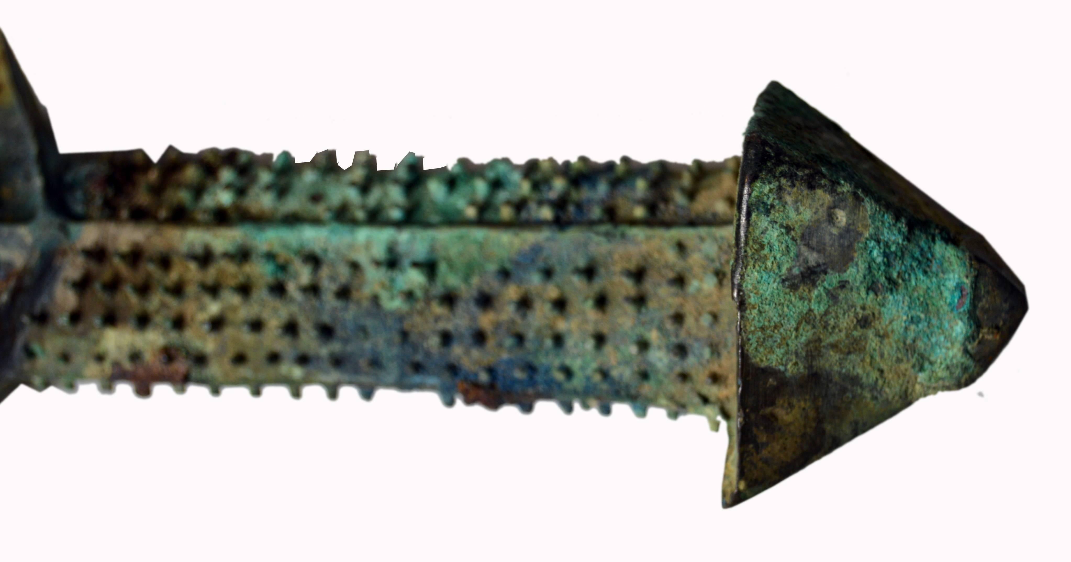 Unusual Chinese Bronze Sword Grip 1