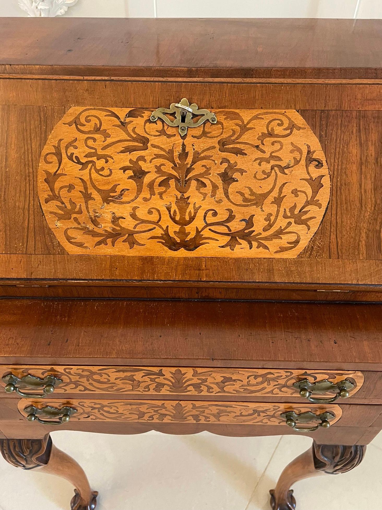 Unusual antique burr walnut marquetry inlaid bureau having a quality burr walnut rectangular top above a pretty crossbanded marquetry inlaid fall opening to reveal a fitted interior consisting of drawers and pigeon holes above two long marquetry