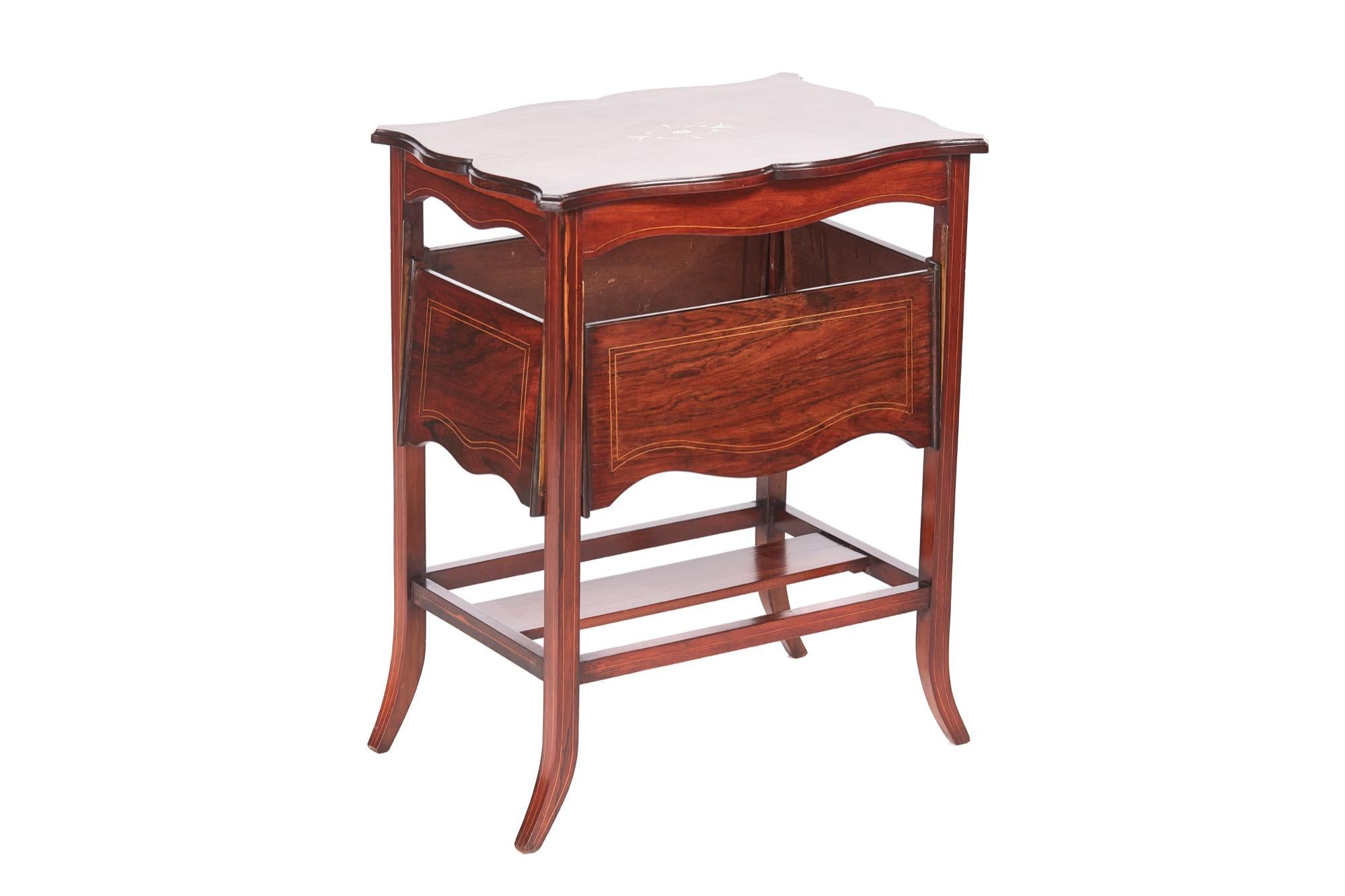 Unusual antique Edwardian inlaid hardwood centre table having a pretty inlaid and shaped rosewood top, four unusual inlaid rosewood shaped drop leaves. It stands on four shaped inlaid rosewood legs and united by square stretchers.

A very