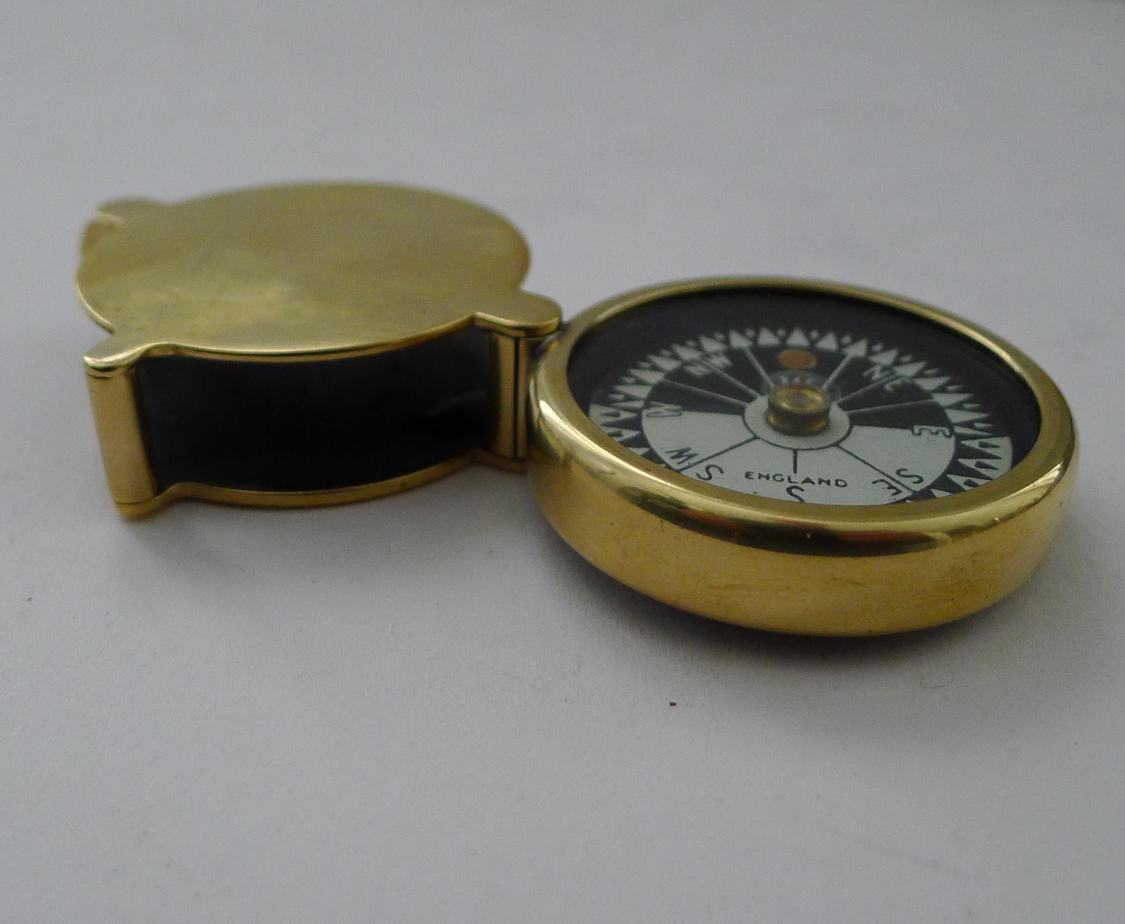 An unusual English compass which folds into it's own brass case.  Marked 