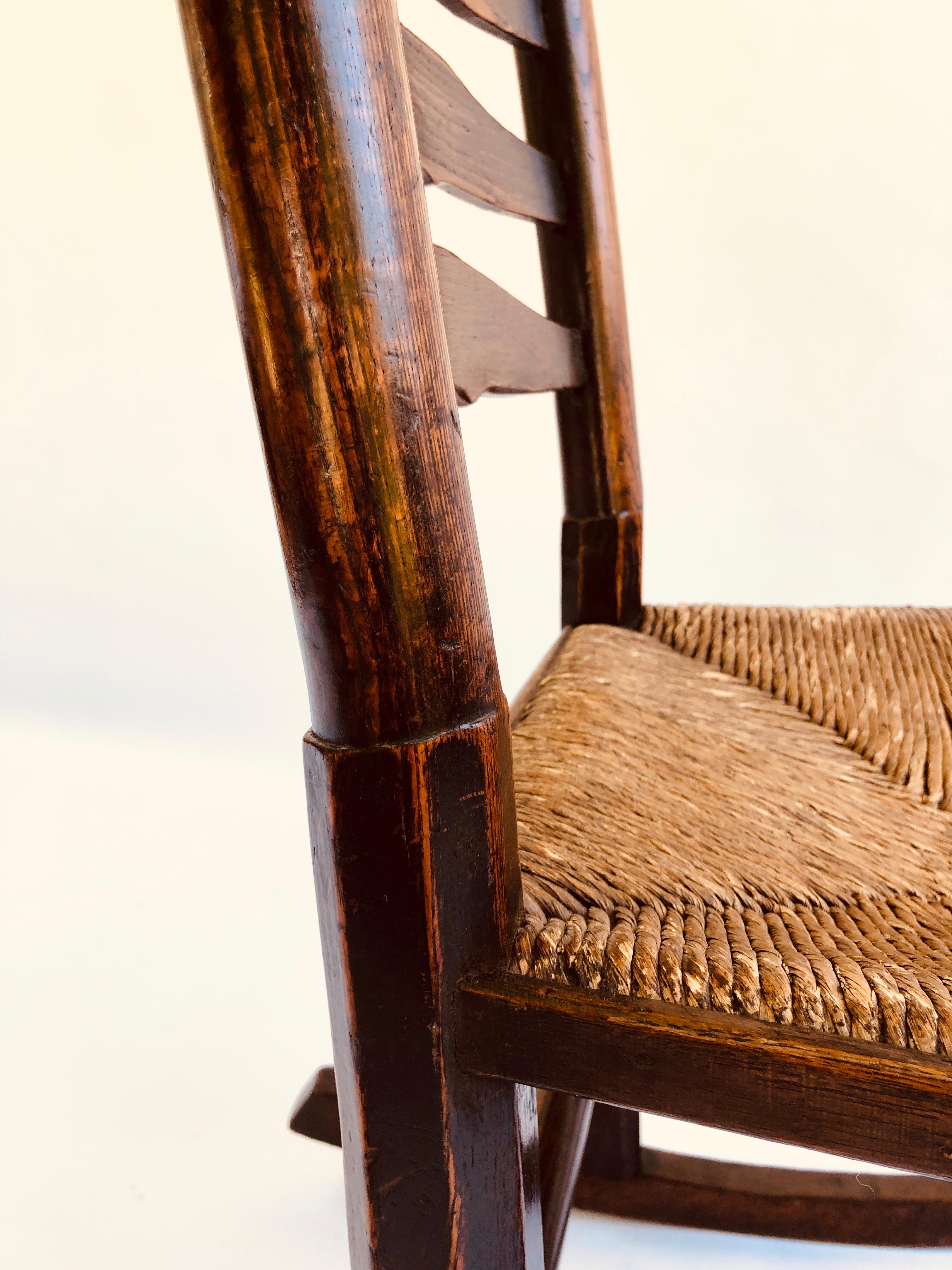 English Unusual Antique Oak Ladder Back Rocking Chair For Sale