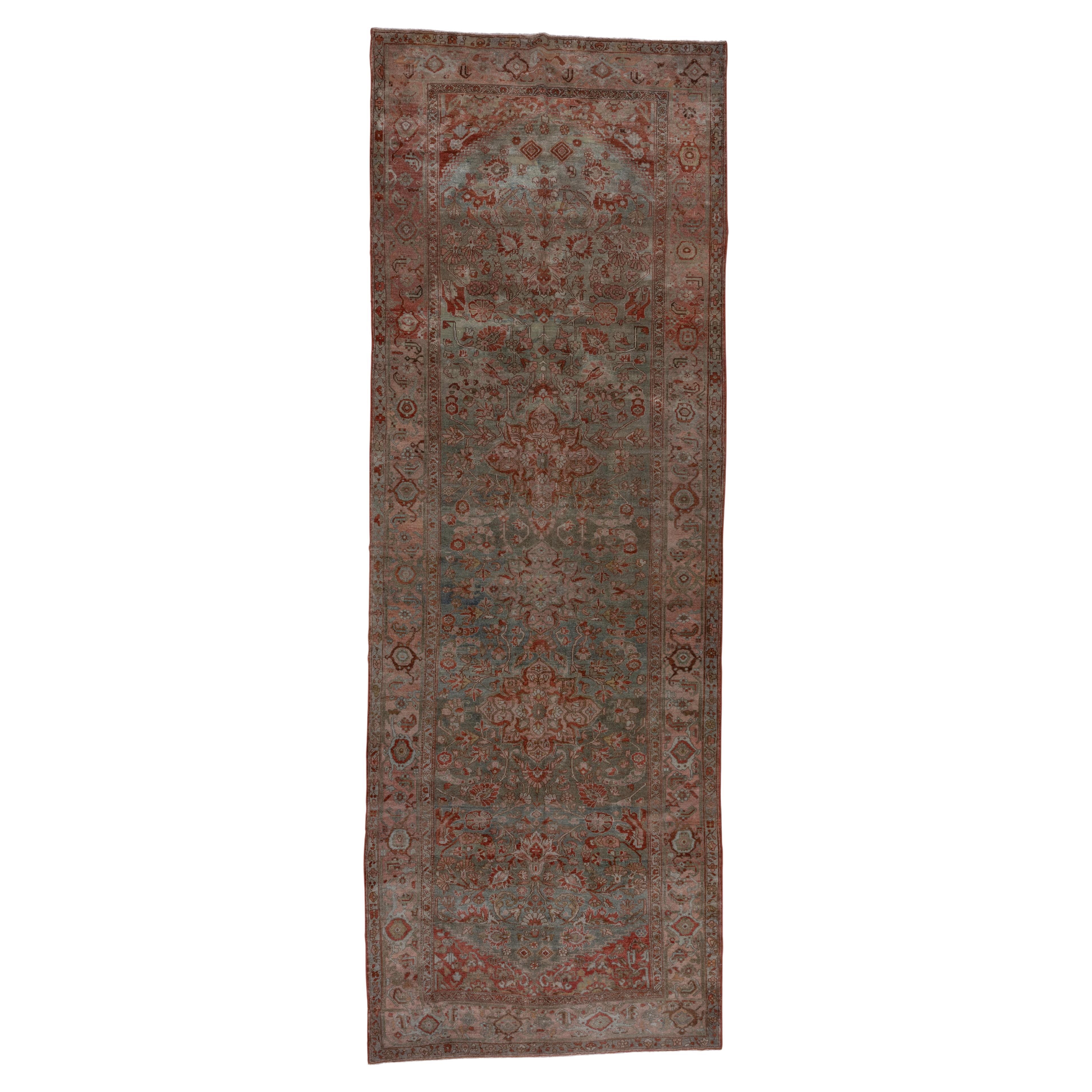 Antique Persian Serapi Rug, Rust Field, Blue Borders, Pink and Green Accents For Sale at 1stDibs