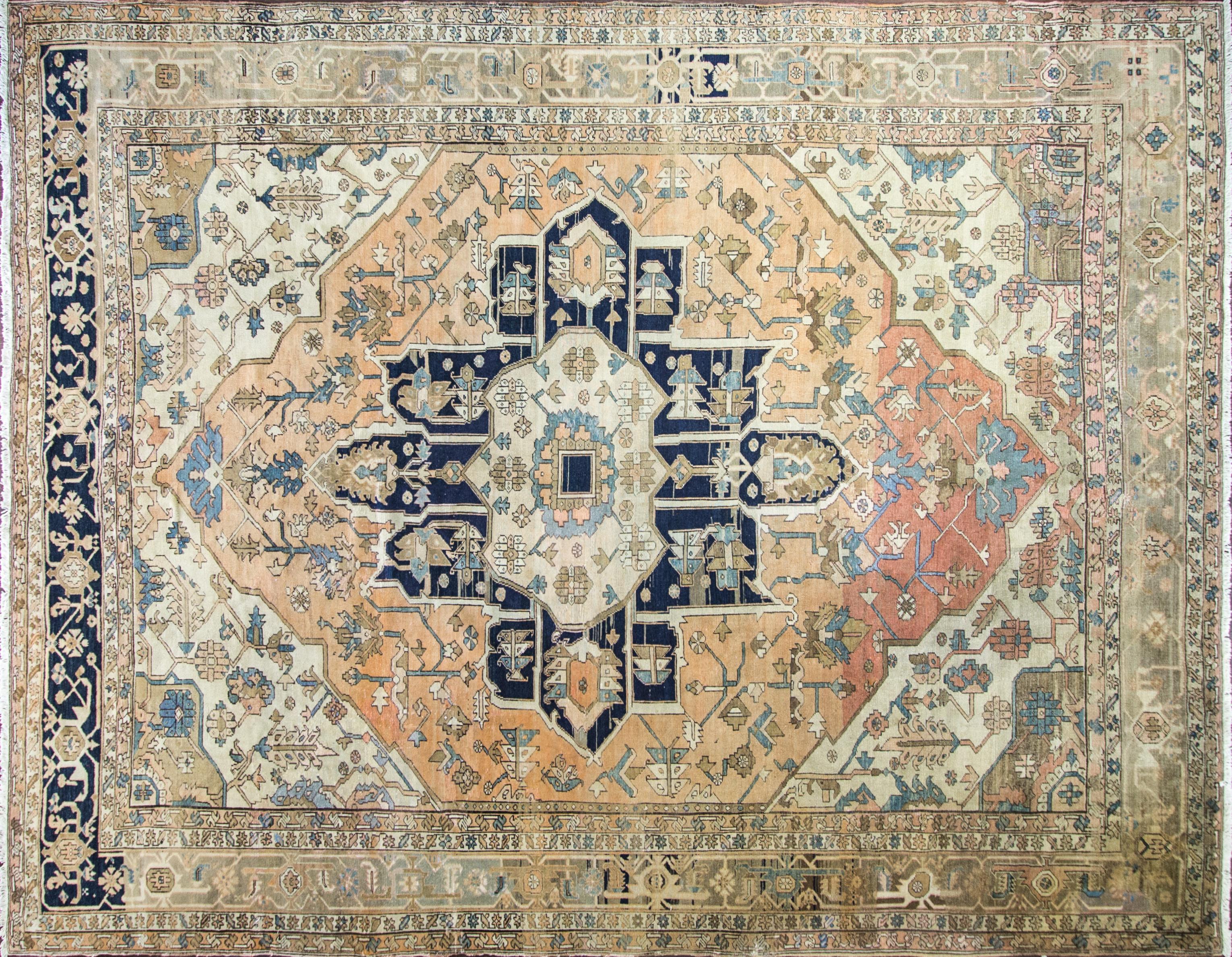 19th century 10' x 13' unusual antique Serapi carpet of Persia. Very unusual colors.
Woven in the rugged mountains of Northwest Persia, Serapi rugs are a distinct Heriz region style, with finer knotting and more large-scale spaciously placed
