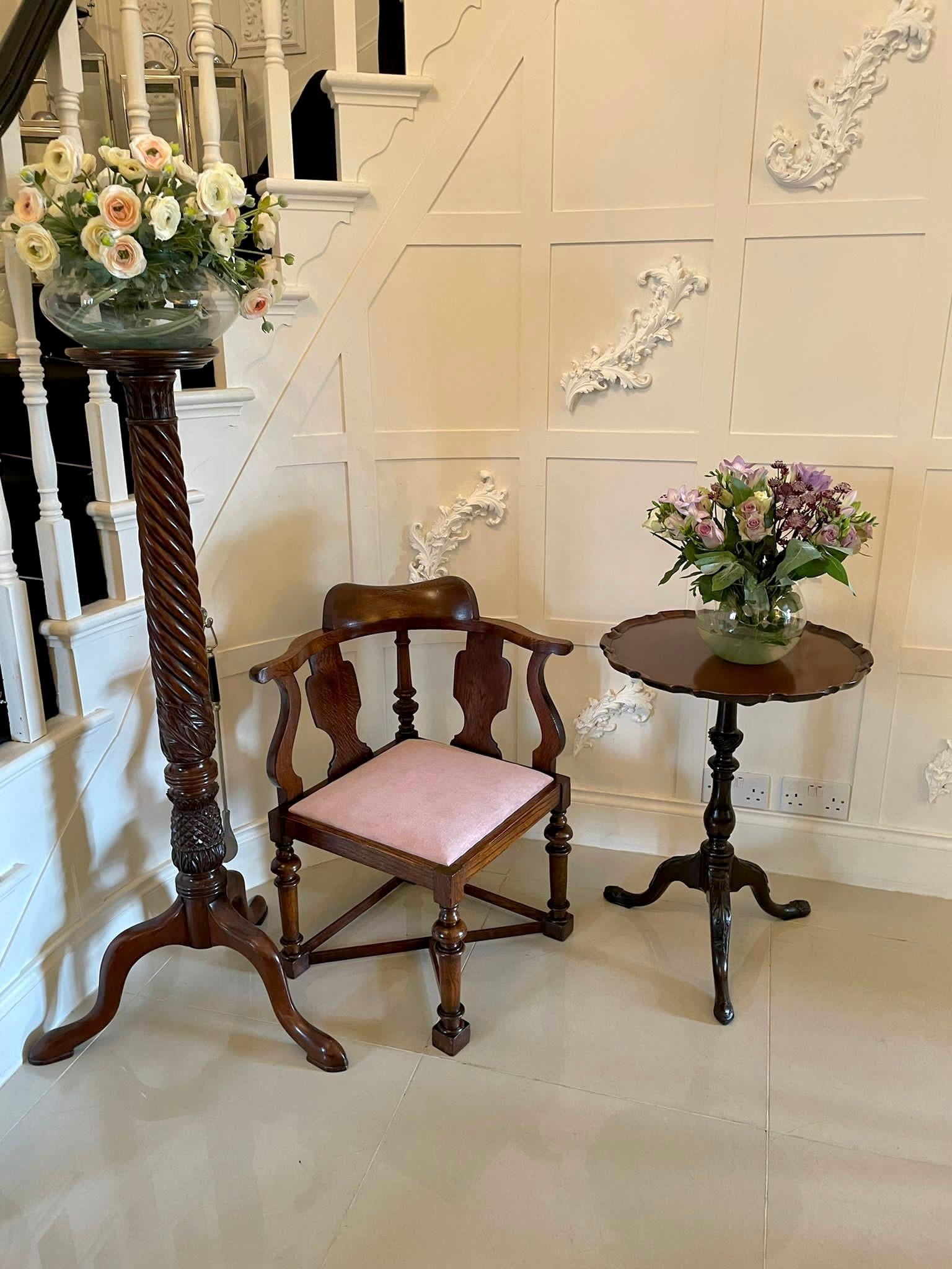 Unusual antique Victorian oak corner chair having a quality shaped top rail supported by a turned column, shaped splats, newly reupholstered drop in seat in a quality stylish fabric, oak frieze standing on turned shaped legs with block feet united