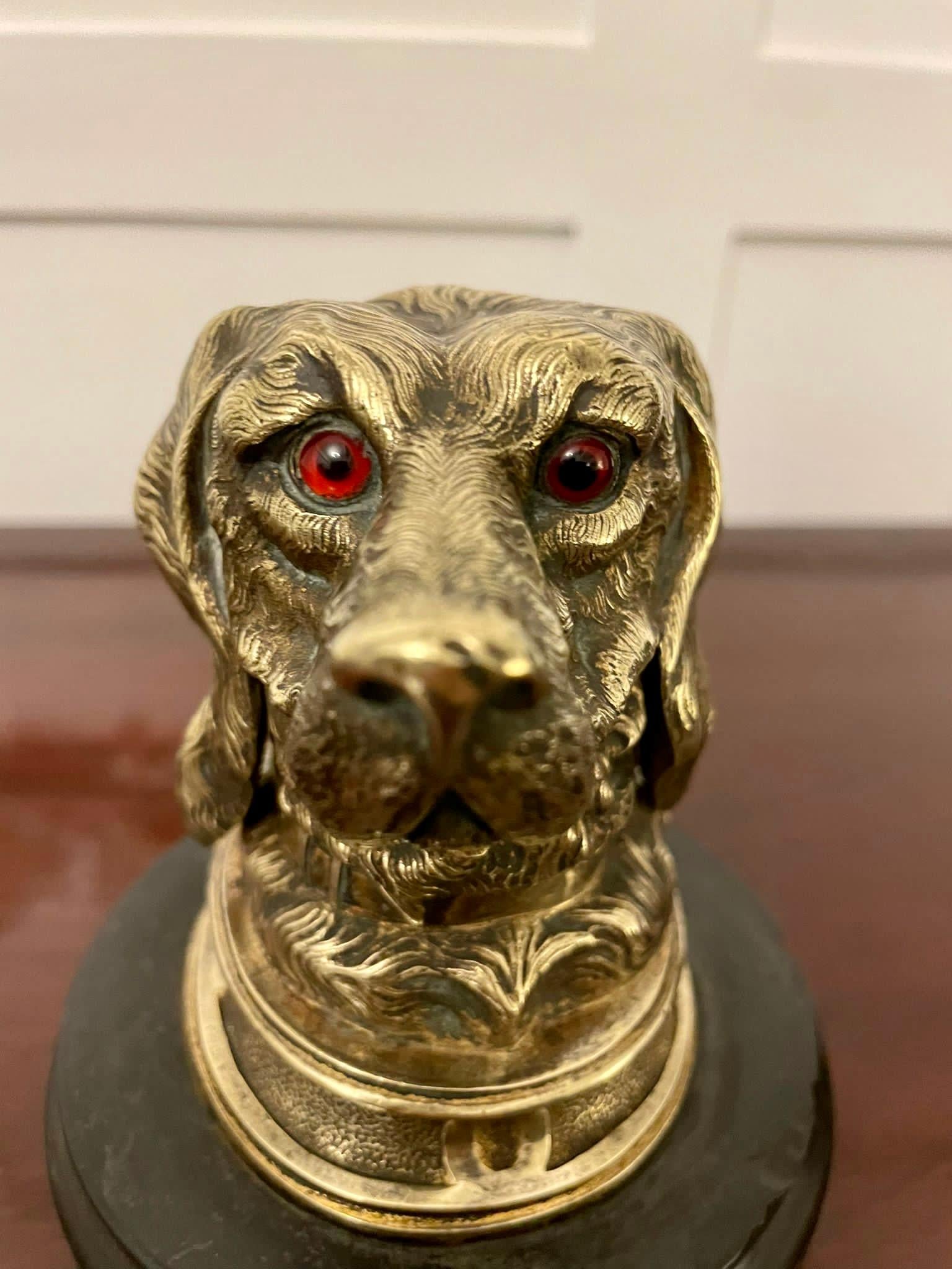 Unusual antique Victorian quality brass inkwell having a quality antique Victorian brass inkwell of a dog with original glass eyes on a circular marble base

Measures: H 11 x W 11 x D 11cm 
Date 1860.
  