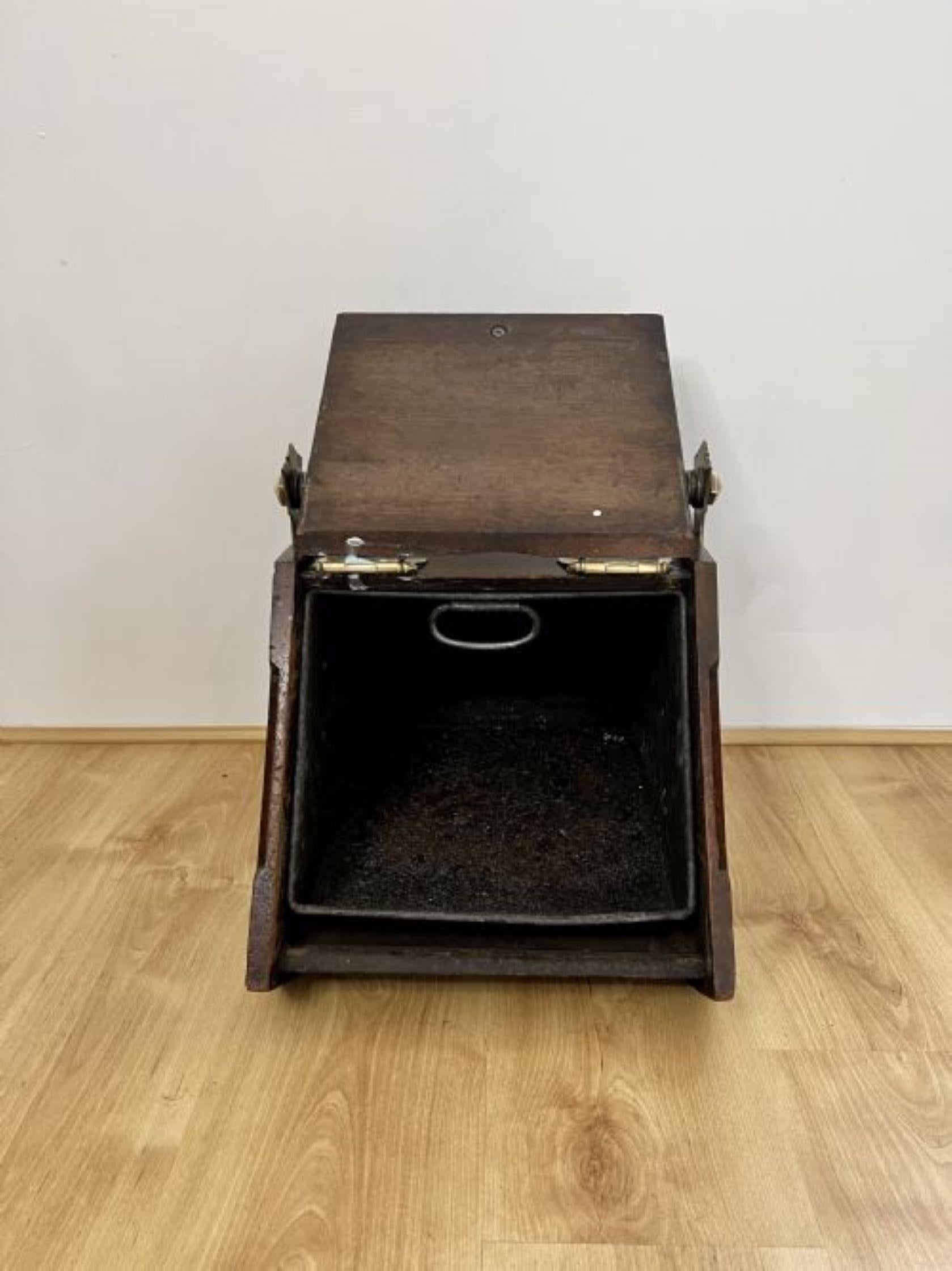 Unusual antique Victorian quality walnut and brass coal box having a quality antique Victorian coal box with fantastic brass decoration with a brass carrying handle to the top with the original tin liner.