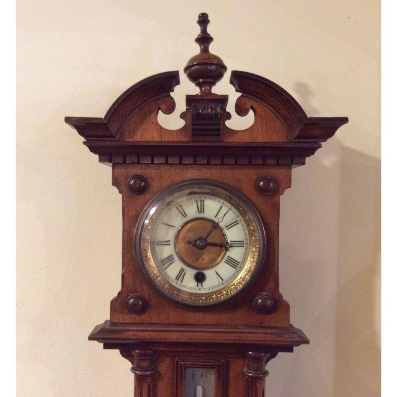 Lovely little antique wall clock with thermometer and aneroid barometer incorporated

C1890 
Measure: 27 ins. tall

Declaration: This item is antique. The date of manufacture has been declared as 1890.

Dimensions:
Height = 73 cm