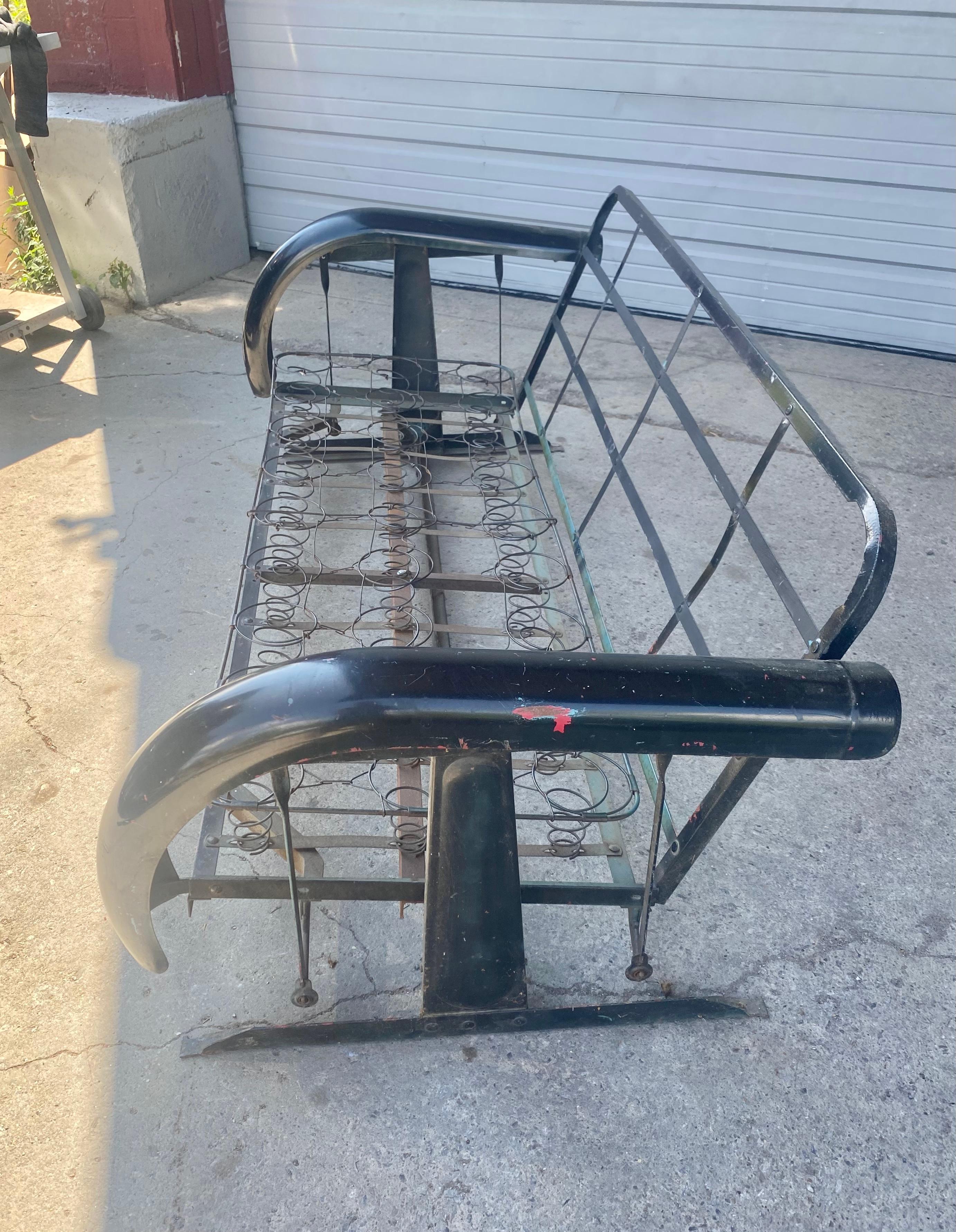 Unusual Art Deco Metal Porch Glider with Skirted Fenders, circa 1930s In Good Condition For Sale In Buffalo, NY