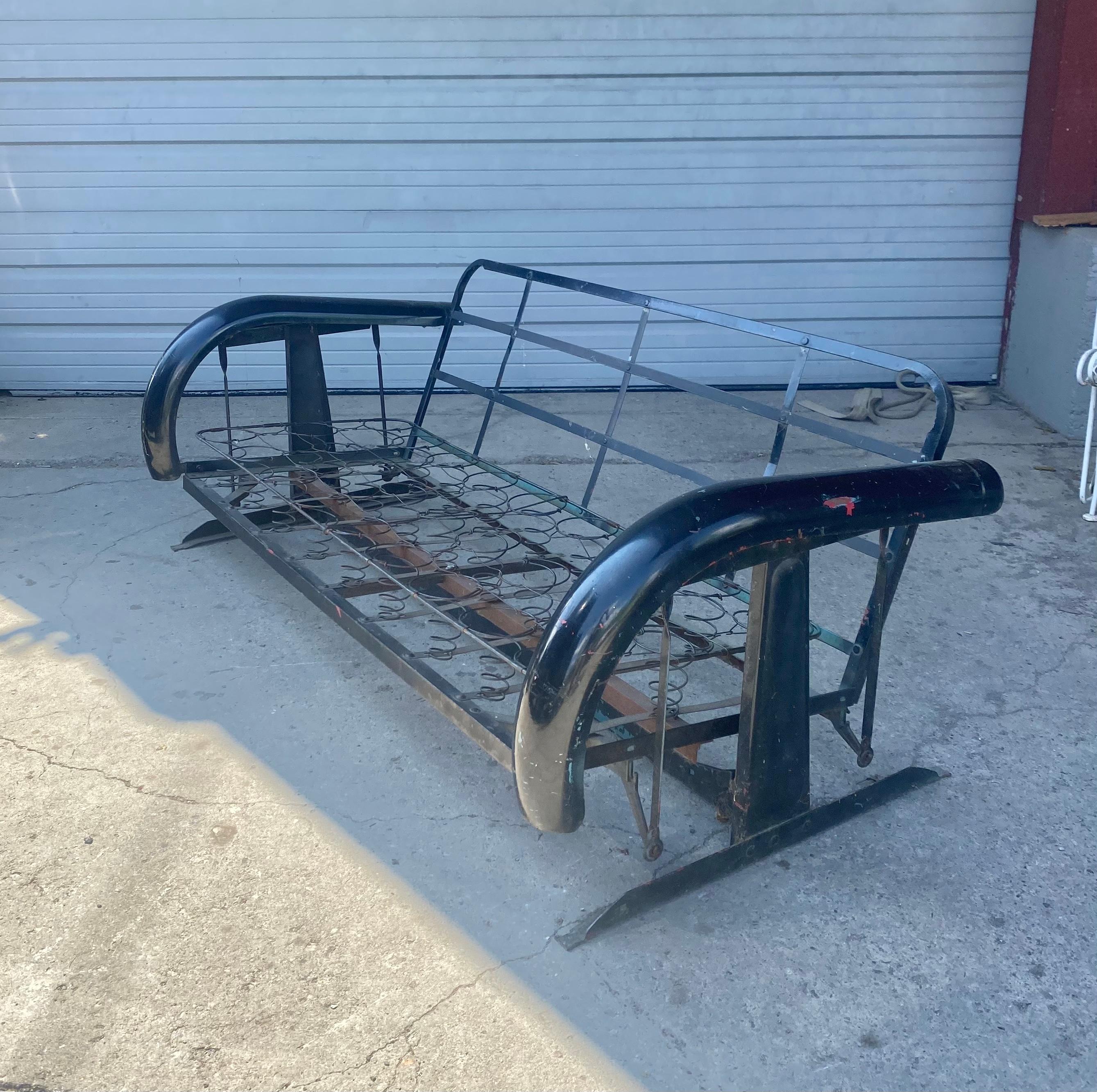 Mid-20th Century Unusual Art Deco Metal Porch Glider with Skirted Fenders, circa 1930s For Sale