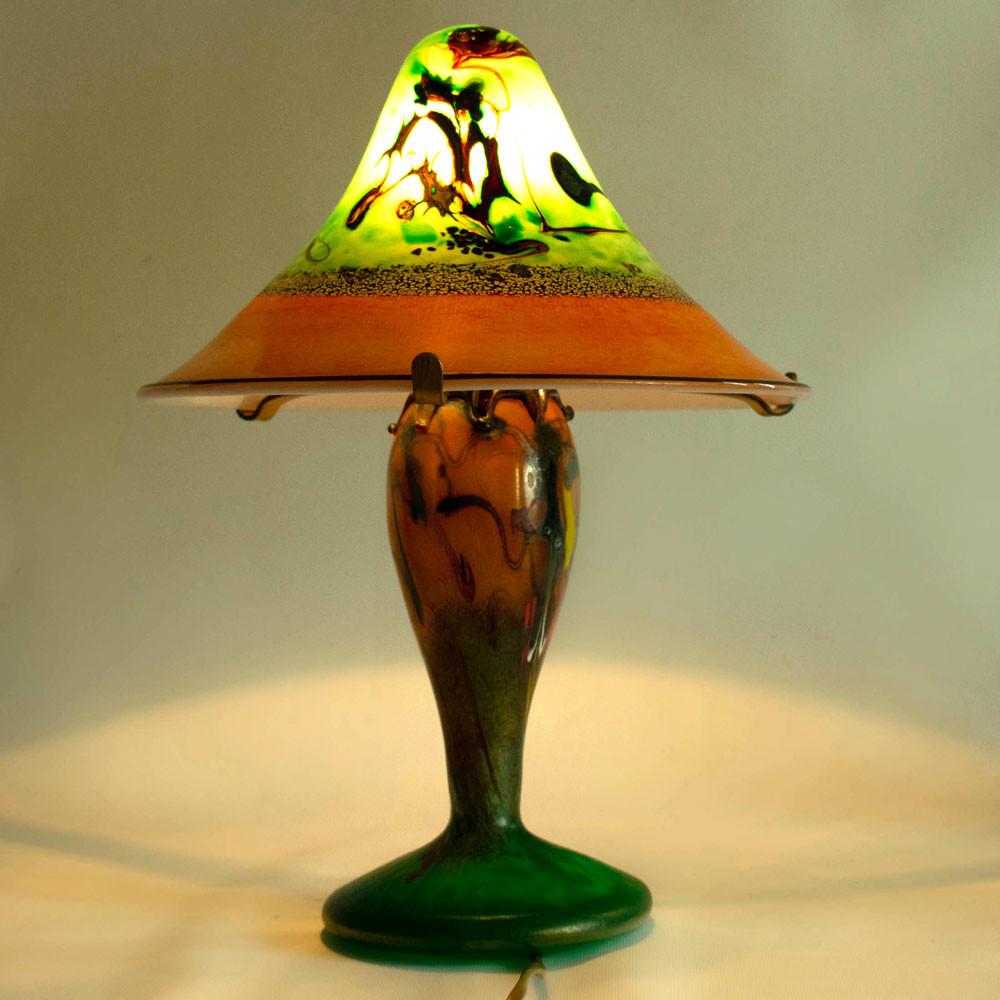 A stunning and unusual French mushroom table lamp in glass of colours of green and red with inclusions of oxides. Signed illegible and dated 07 - most probably by La Rochère, manufacturers of lamps and glassware in France, who are known to produce
