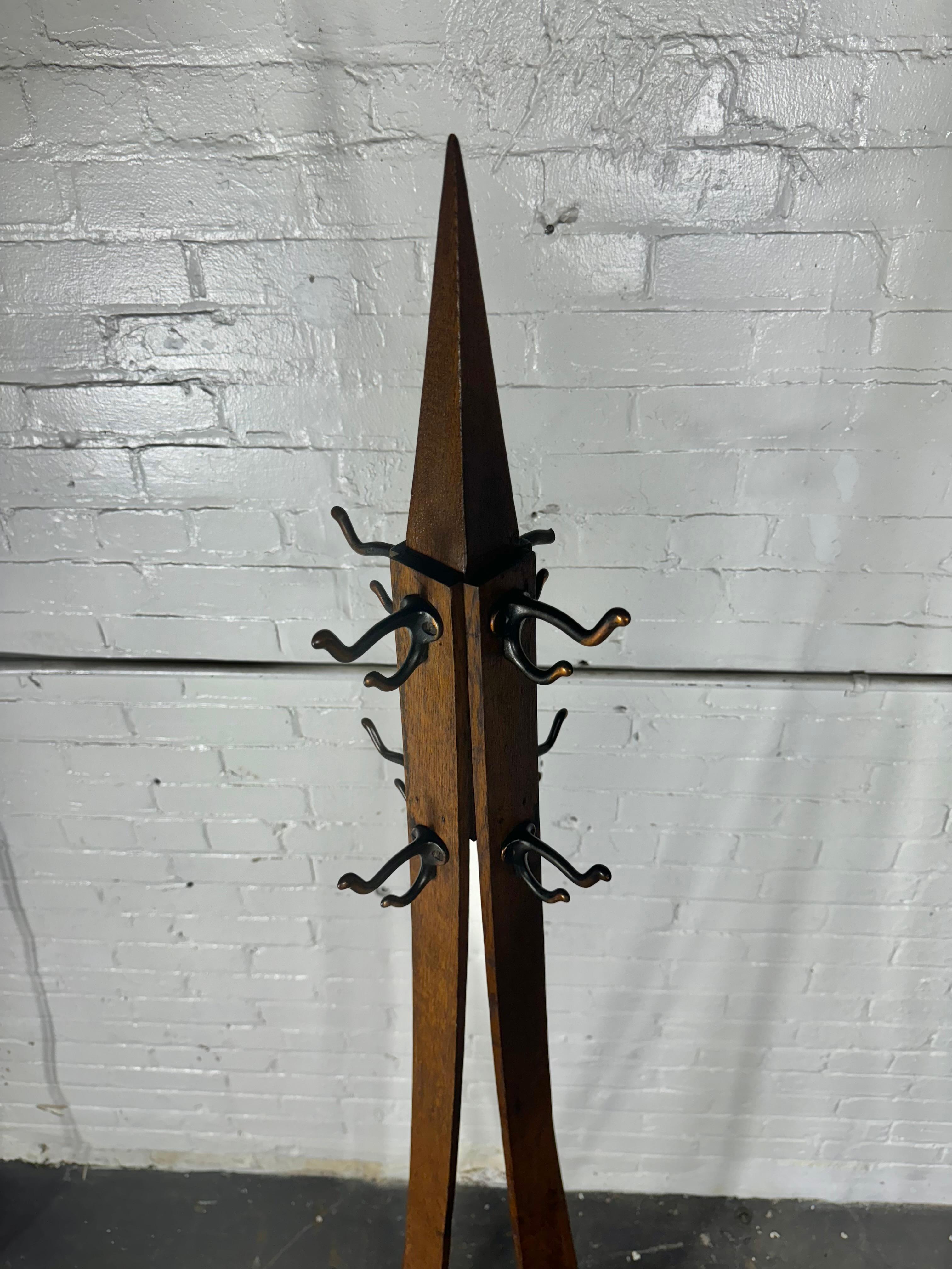 Arts and Crafts / Mission Oak Coat Tree / Rack , free-standing , brass hooks .Very unusual design,, pointed top,, Retains original finish / patina, one brass hook broken. (see photo)  