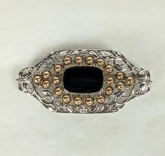 Unusual Arts and Crafts Platinum, Gold and Onyx Brooch, F.G. Hale