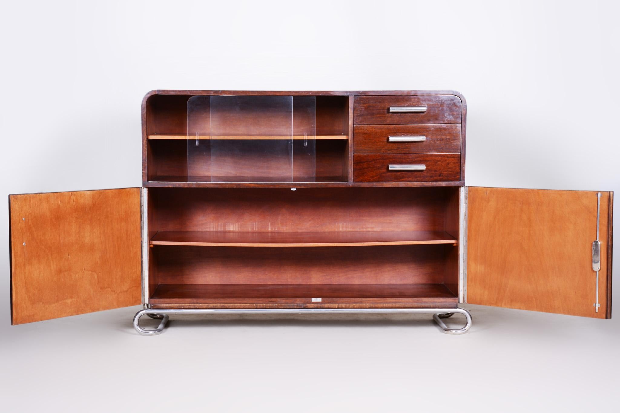 Bauhaus sideboard with drawers, cabinet.
Original well preserved condition.
Country of origin is Czechia (Czechoslovakia) from period 1930-1939.
Material: Mahogany chrome-plated steel and glass

Maker: Mücke - Melder.