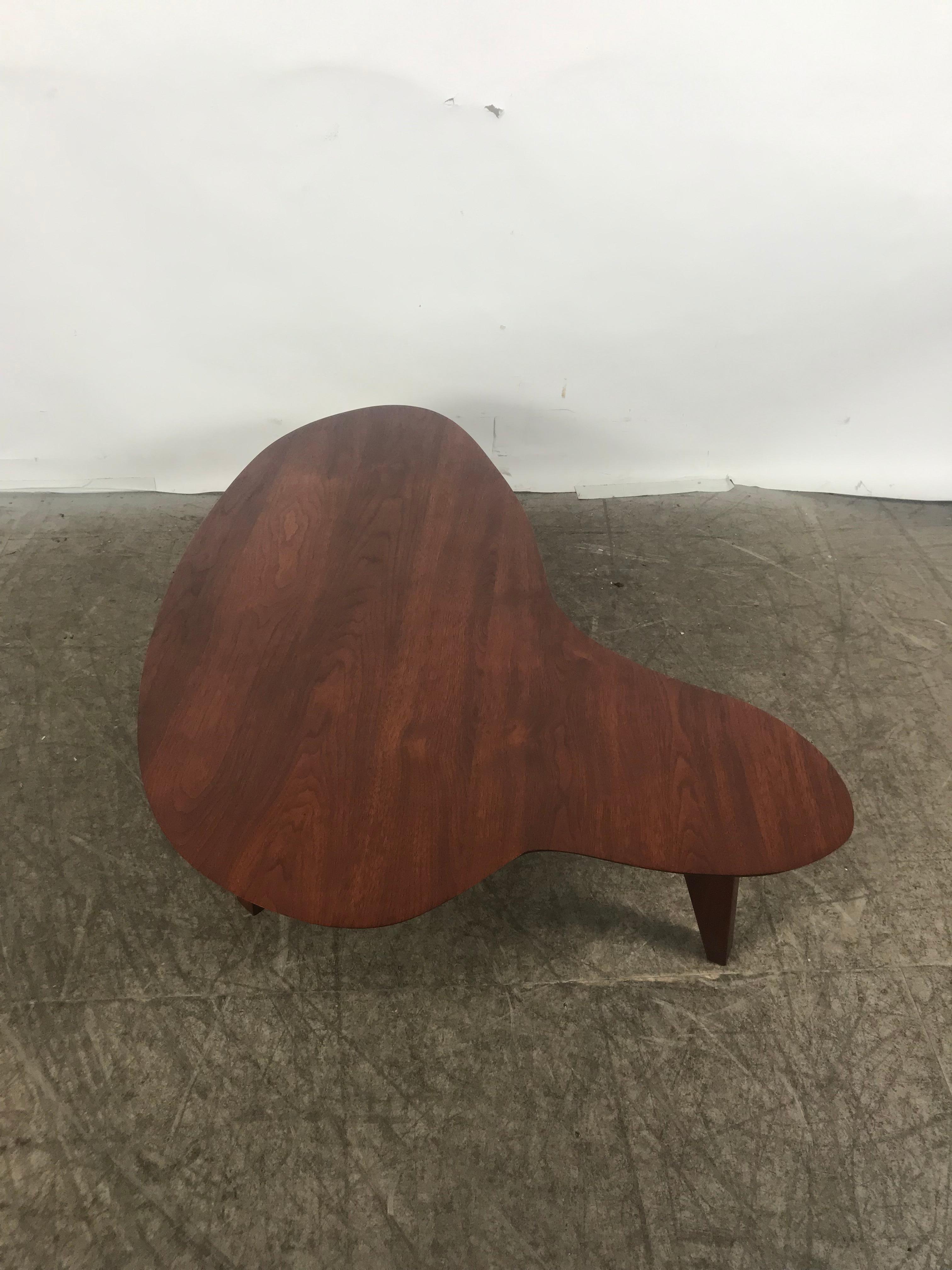 Unusual biomorphic, amoeba shape midcentury walnut cocktail / coffee table, amazing quality and form, beveled top, custom bench made, perfect proportions, fit seamlessly into any modern, contemporary ,eclectic environment.
