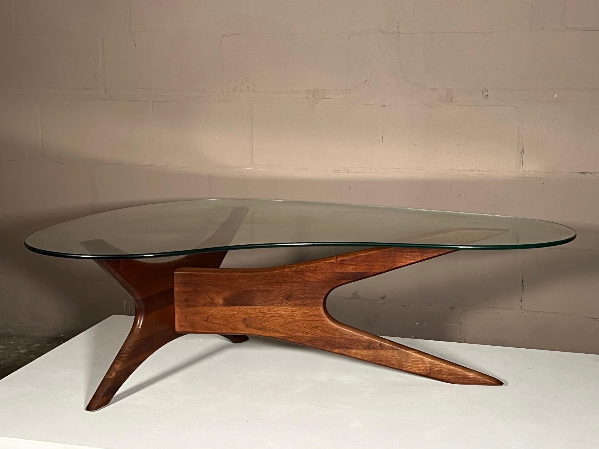 A rare and unusual biomorphic 1960's coffee table designed by Adrian Pearsall and made by Craft Associates, Wilkes-Barre , Pa, production reference 1465-T. Solid walnut base with beautiful graining and original crystal top 7/16