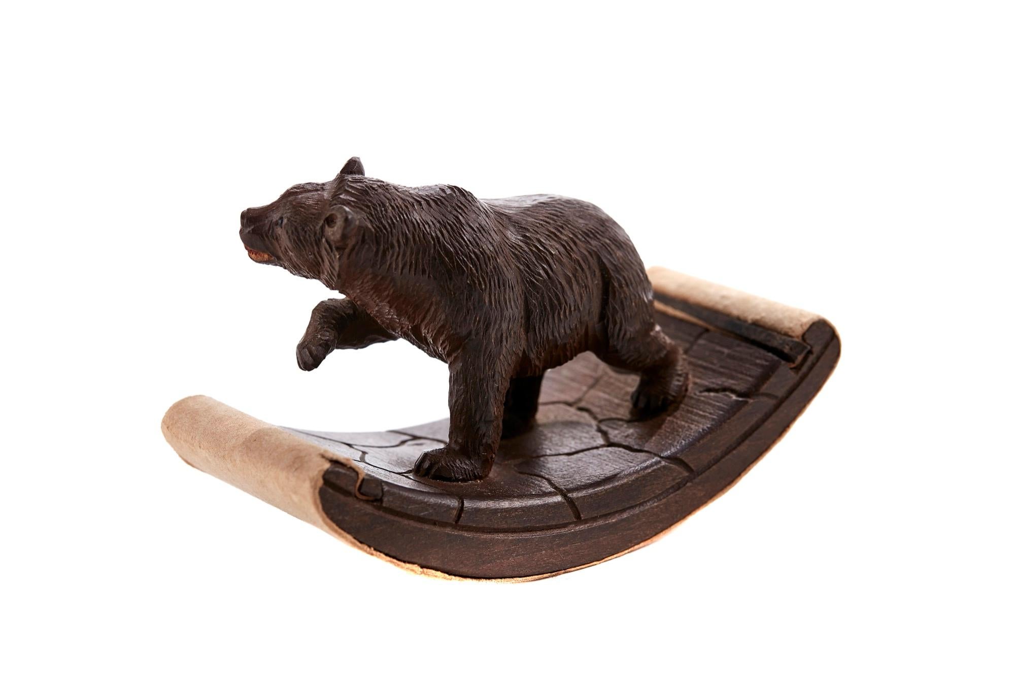 This is an unusual carved 19th century antique black forest bear desk blotter which is a well modeled carved Bear. Lovely quality and condition.