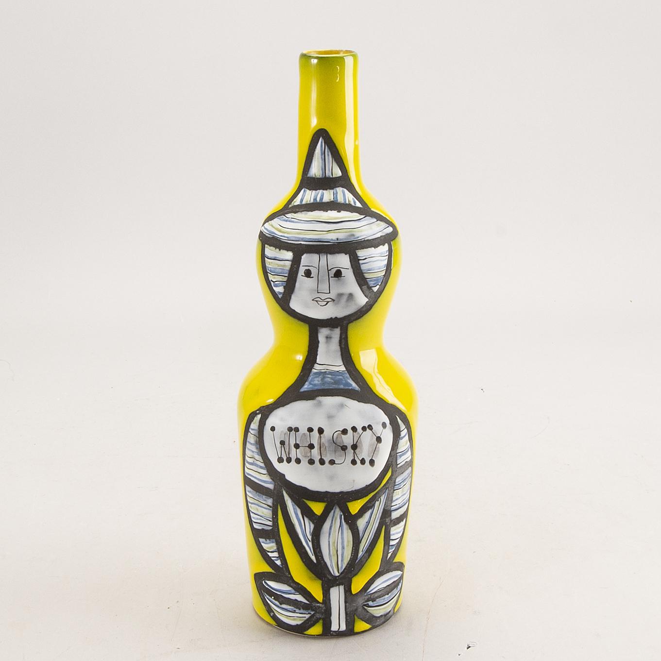 Roger Capron (1922-2006)
Shiny yellow with Stylized personnage bottle 