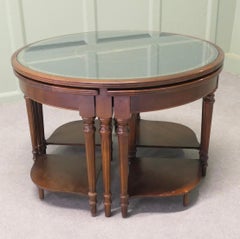 Unusual Circular Nest of Library Tables This is a very unusual set of tables