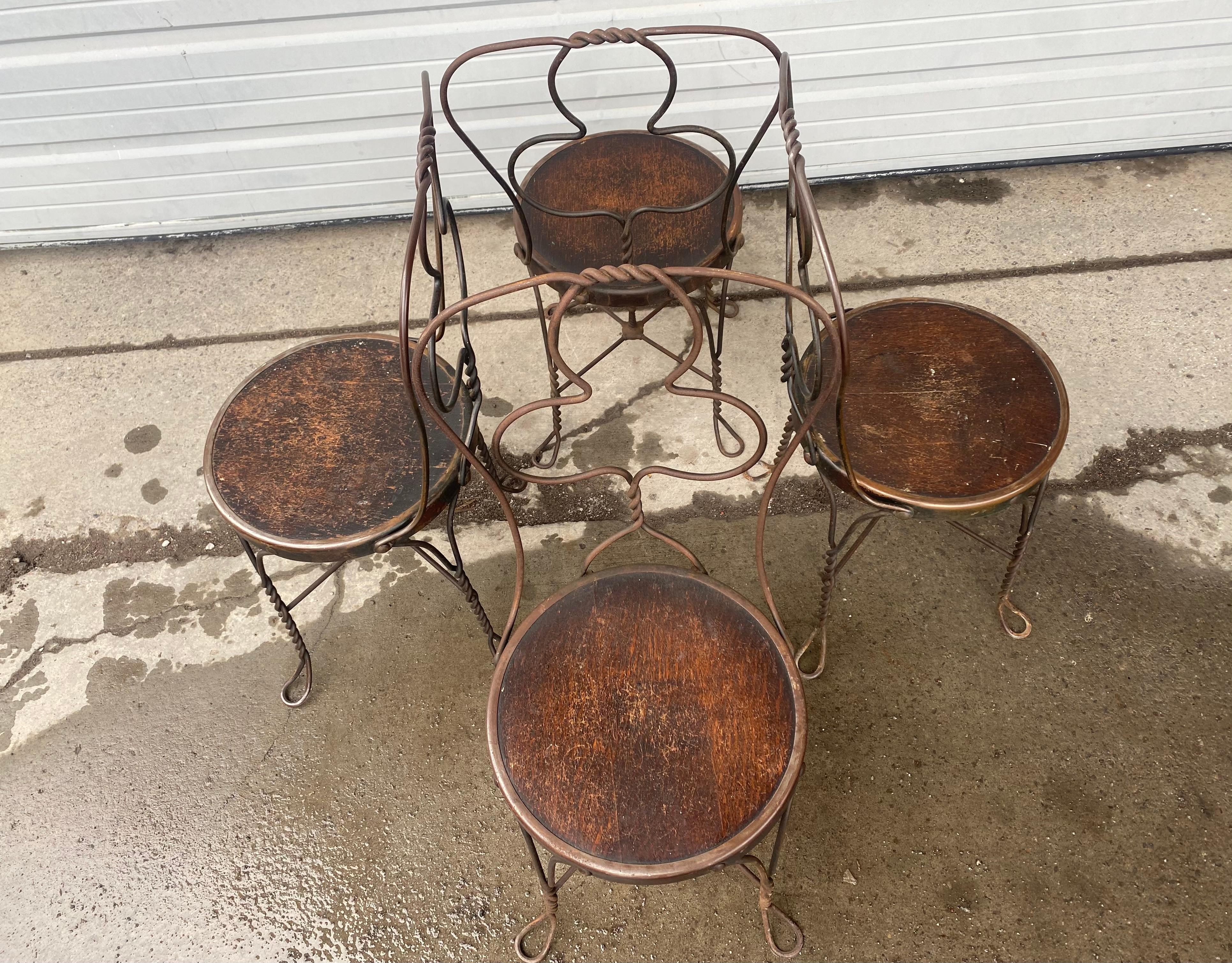 Unusual Club Back Bistro Chairs Wrought Iron Ice Cream Parlor Early 20th Cent In Good Condition For Sale In Buffalo, NY