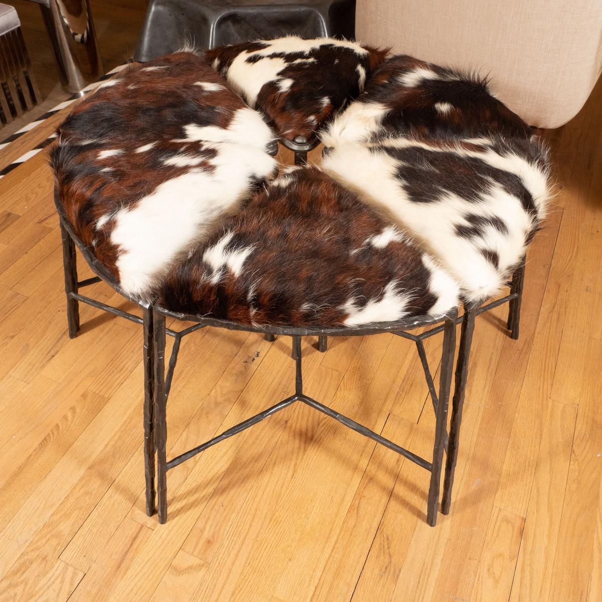 Unusual cluster of six pie shaped upholstered seat and blackened iron benches.