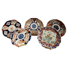 Unusual collection of five antique Japanese imari plates