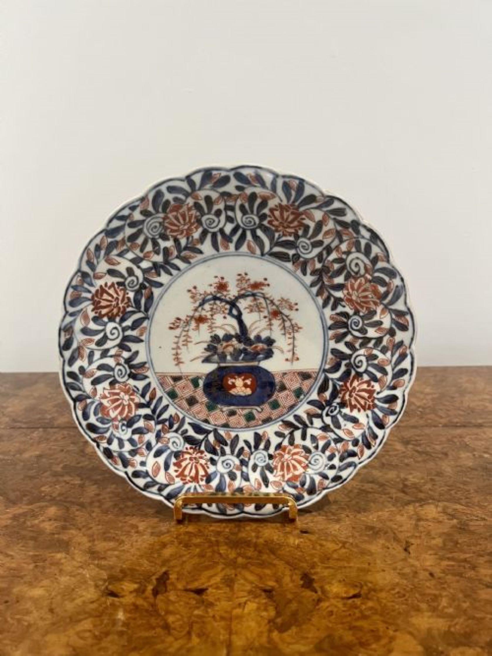 Unusual Collection of three antique Japanese imari dishes having a lovely collection of three antique Japanese imari dishes hand painted with figures, flowers, scrolls and trees in wonderful blue, white, red, gold, green and yellow colours. 
