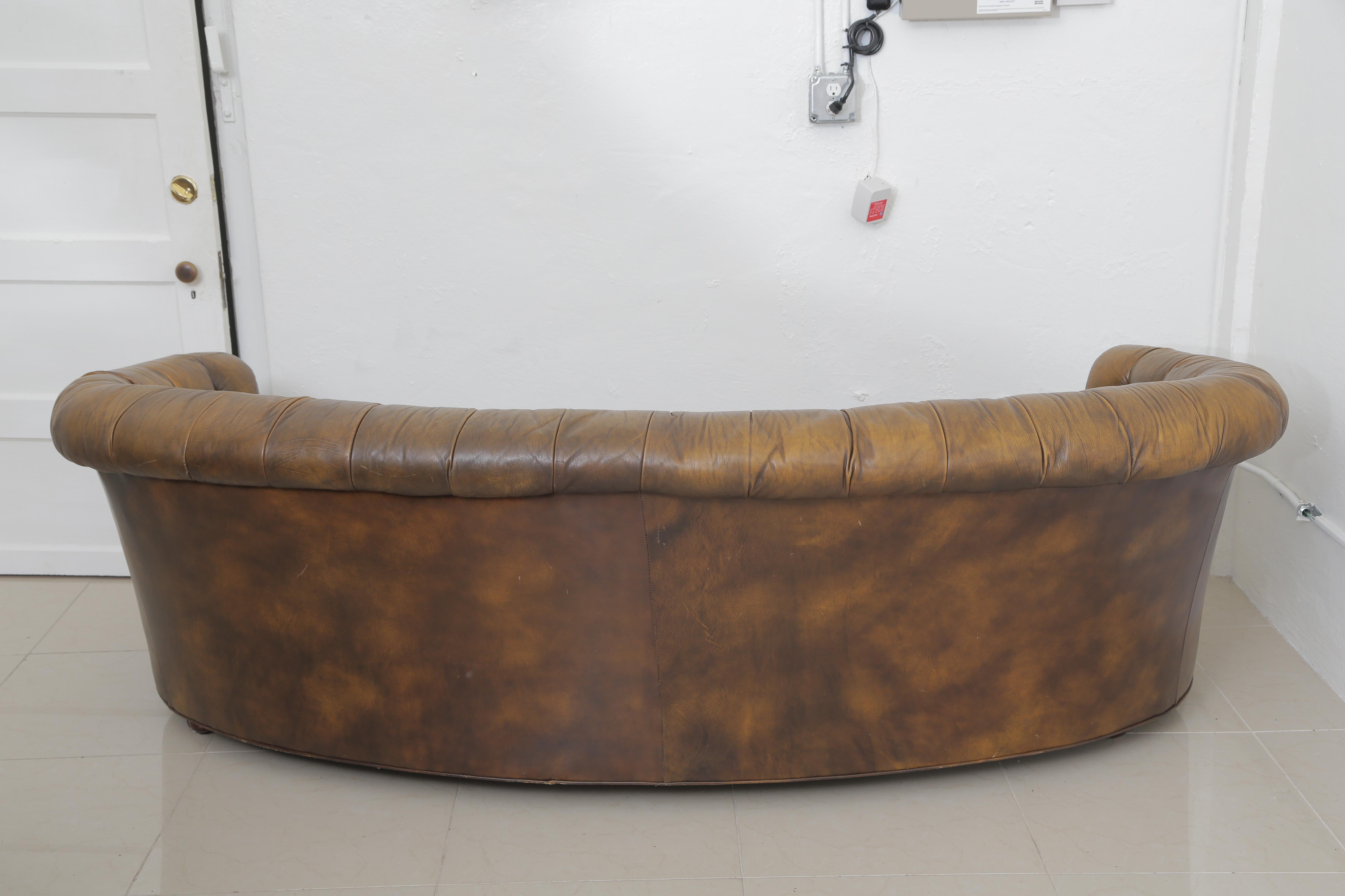 Unusual Curve Vintage Chesterfield Leather Sofa and Chair on Wheels In Good Condition In West Palm Beach, FL