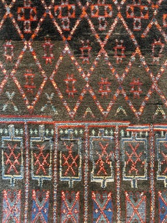Unusual dark toned vintage Beni M'Guild carpet curated by Breuckelen Berber