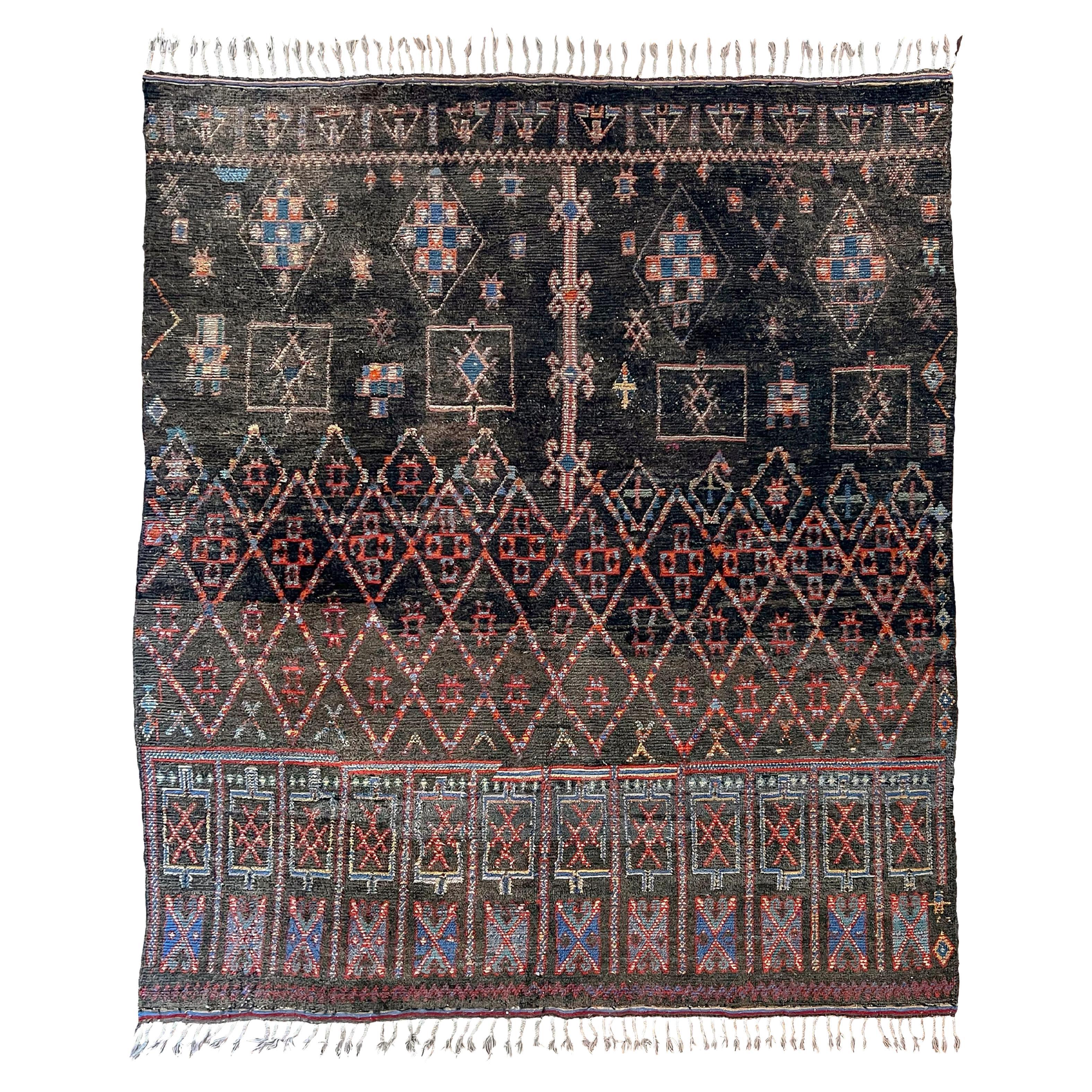 Unusual dark toned vintage Beni M'Guild carpet curated by Breuckelen Berber For Sale