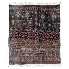 Unusual dark toned vintage Beni M'Guild carpet curated by Breuckelen Berber