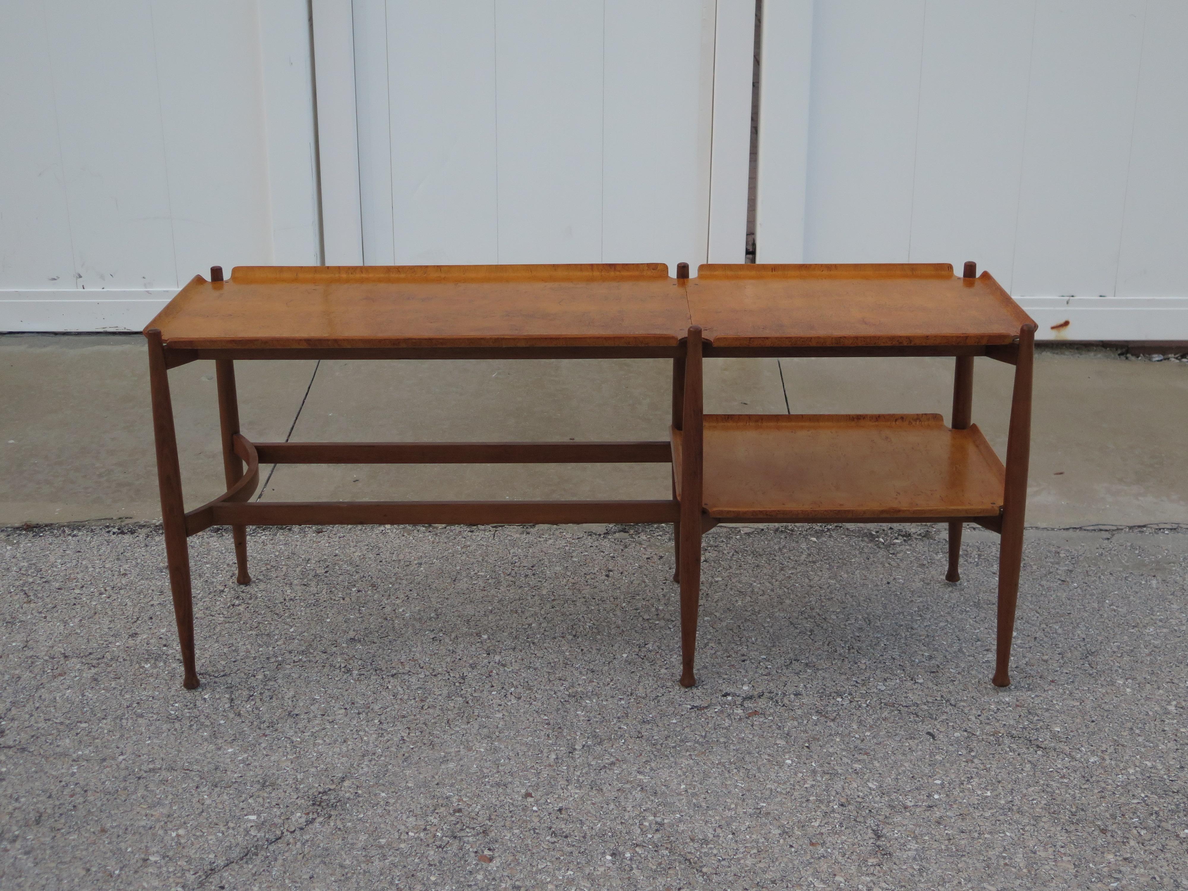 Unusual Dunbar sofa or console table. Made of rosewood and karelian birch. Lower shelf for extra storage.