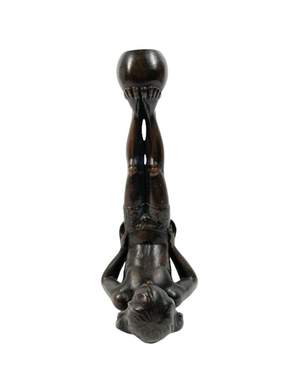 Art Deco Unusual Early 20th C Figural Candlestick of a Boy Holding a Ball on His Feet For Sale