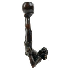 Unusual Early 20th C Figural Candlestick of a Boy Holding a Ball on His Feet