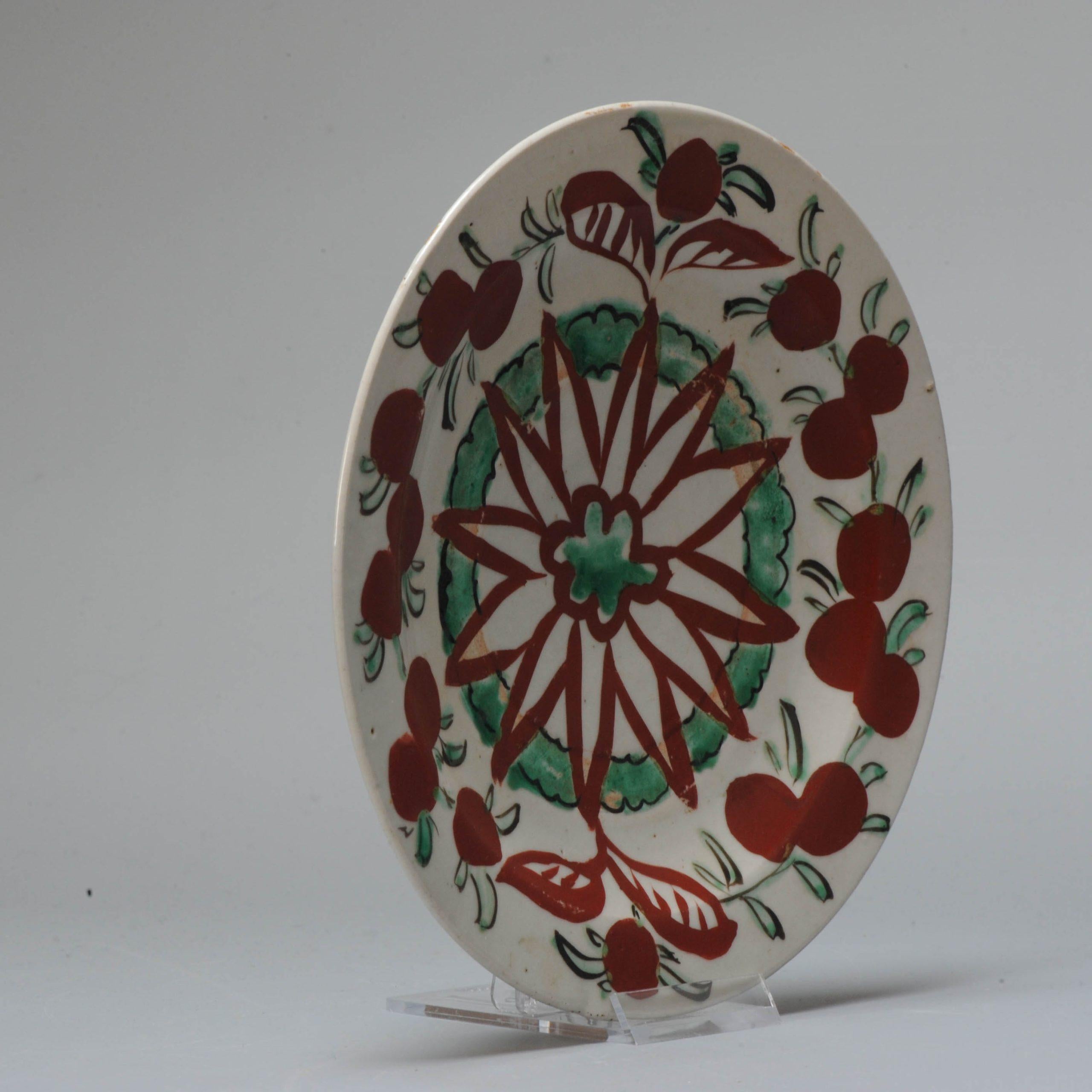 A rare piece of Japanese porcelain with thick enamel in Red and Green. Flower and fruits.

Additional information:
Material: Porcelain & Pottery
Region of Origin: Japan
Period: 17th century, 18th century Edo Period (1603–1867)
Condition: