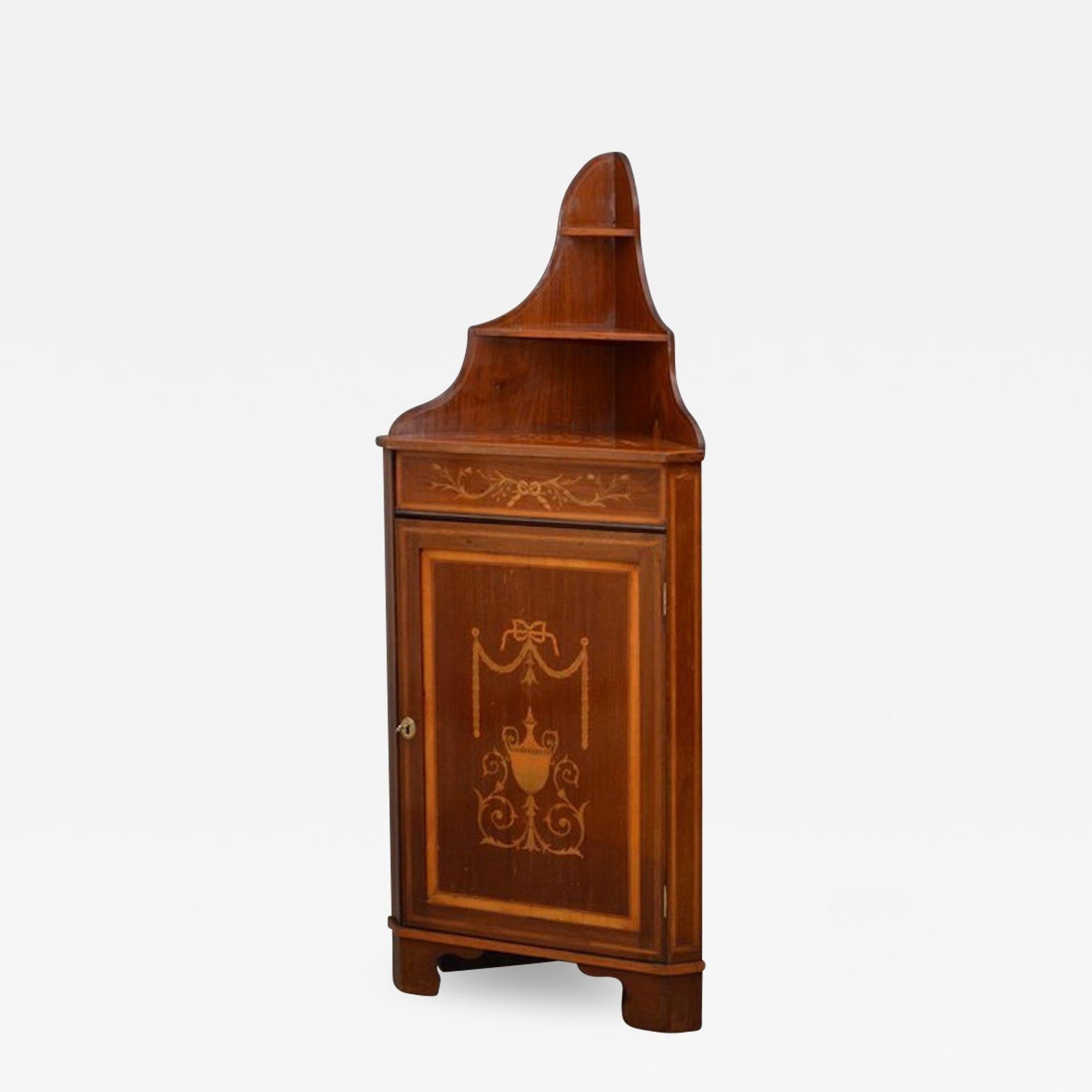 Sn3786 Edwardian Sheraton revival, mahogany corner cabinet / drinks cabinet, having shaped upstand to top (optional) and finely inlaid top and frieze above panelled crossbanded and inlaid cupboard door fitted with working lock and key and enclosing