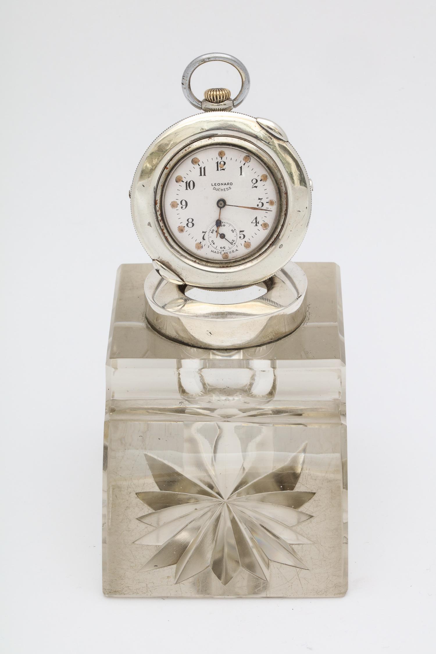 Unusual, Edwardian, sterling silver-mounted crystal inkwell or pocket watch holder, Birmingham, England, 1902, J. Grinsell and Son - makers. Measures 3 1/4 inches high when watch holder is lying flat (4 3/4 inches high when watch holder is in raised