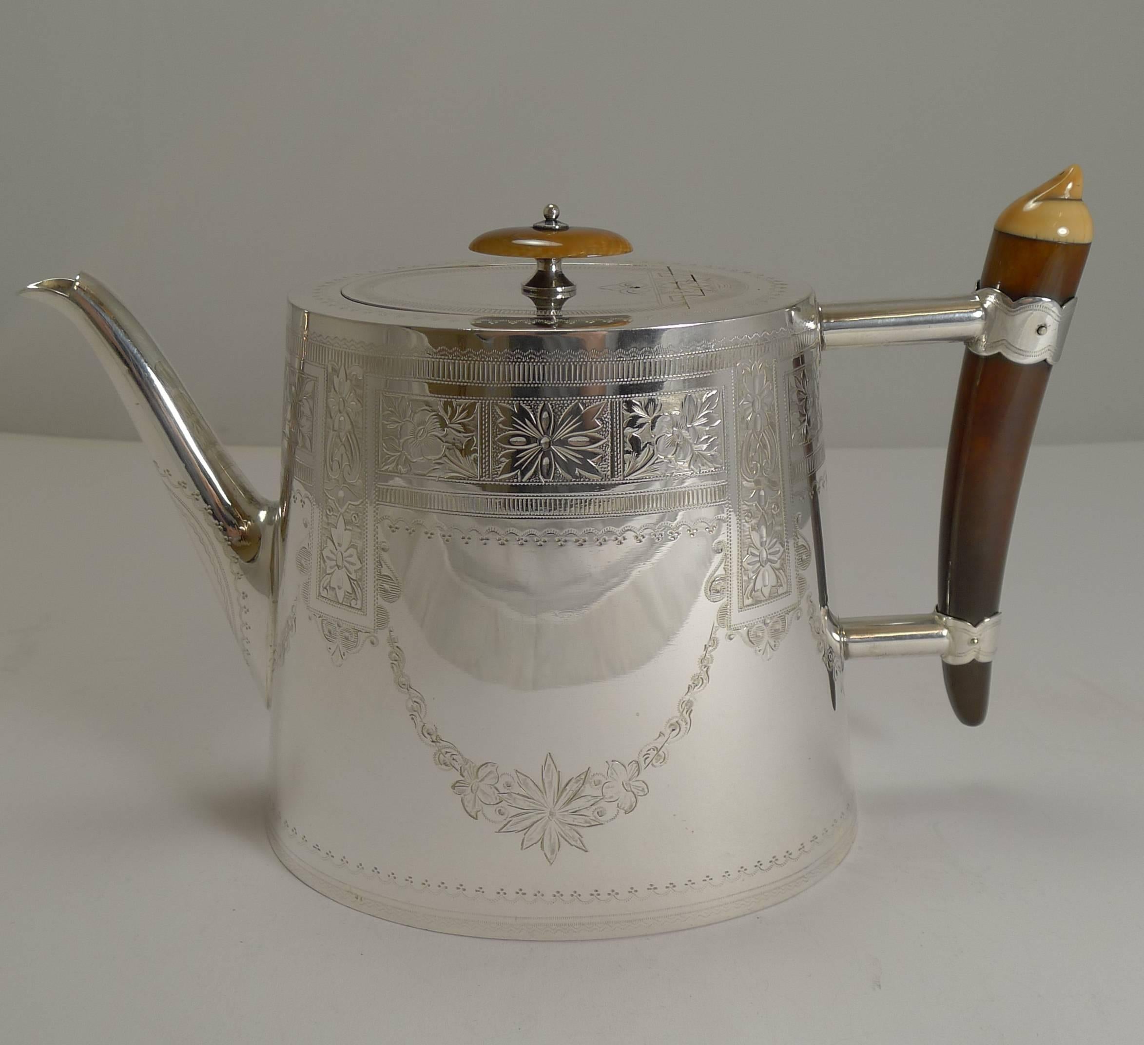 A most unusual and very stylish three piece tea service made from English EPNS (Electro-Plated Nickel Silver) and dating to circa 1890-1900, late Victorian in era.

The set is lovely quality in an ovoid form, the teapot with a top-notch flush