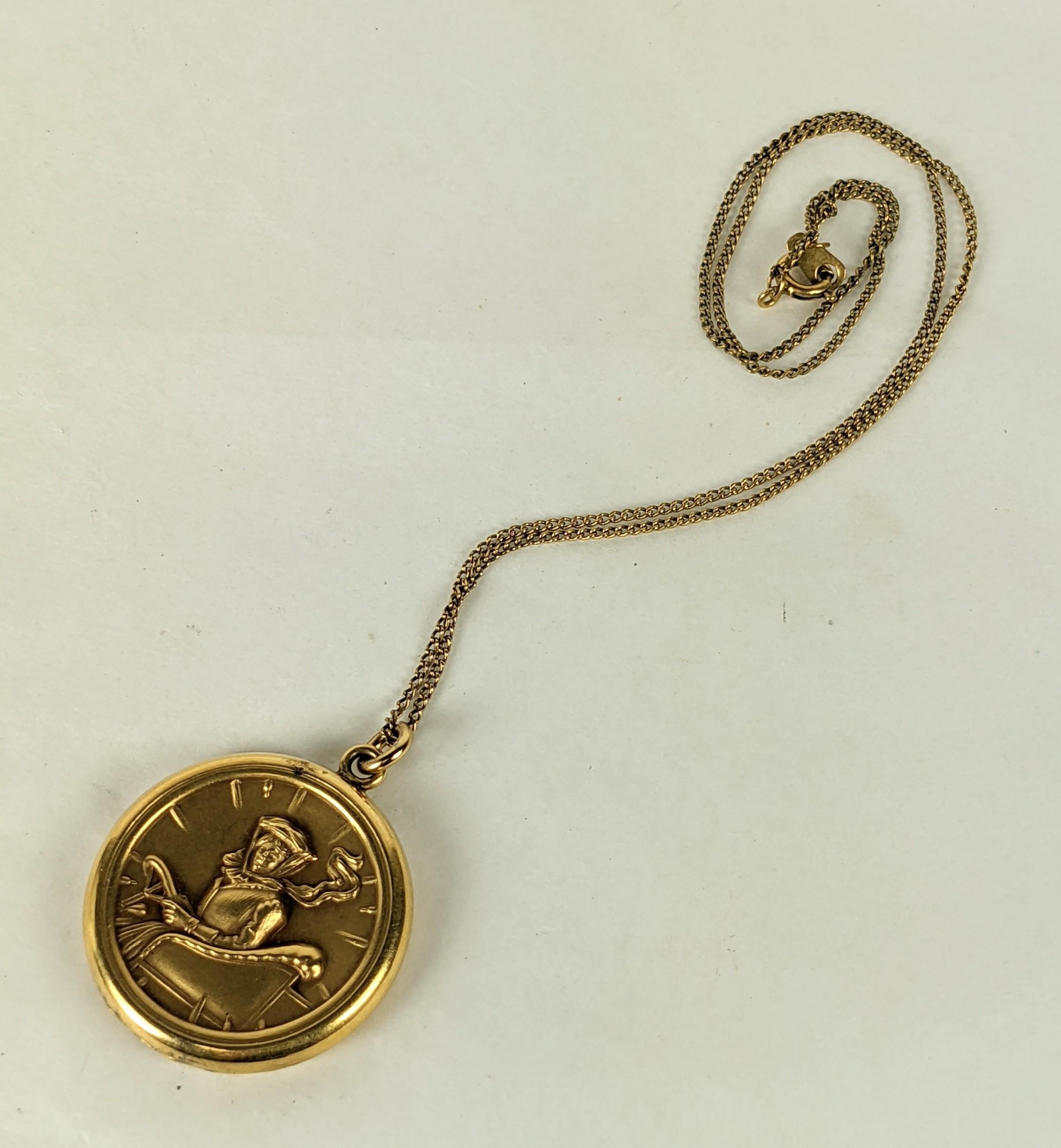 Unusual Edwardian Locket, Lady Carriage Driver in repouse on matte gold filled period locket. 
Signed 