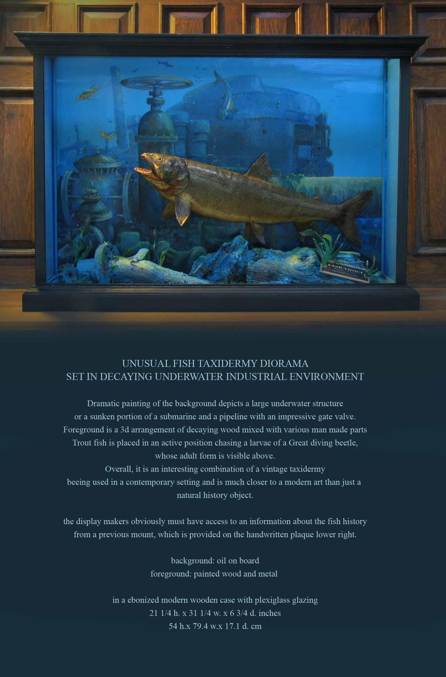 Unusual fish taxidermy diorama set in decaying underwater industrial environment.

 A dramatic painting in the background depicts a large underwater structure or a sunken portion of a submarine and a pipeline with an impressive gate valve.