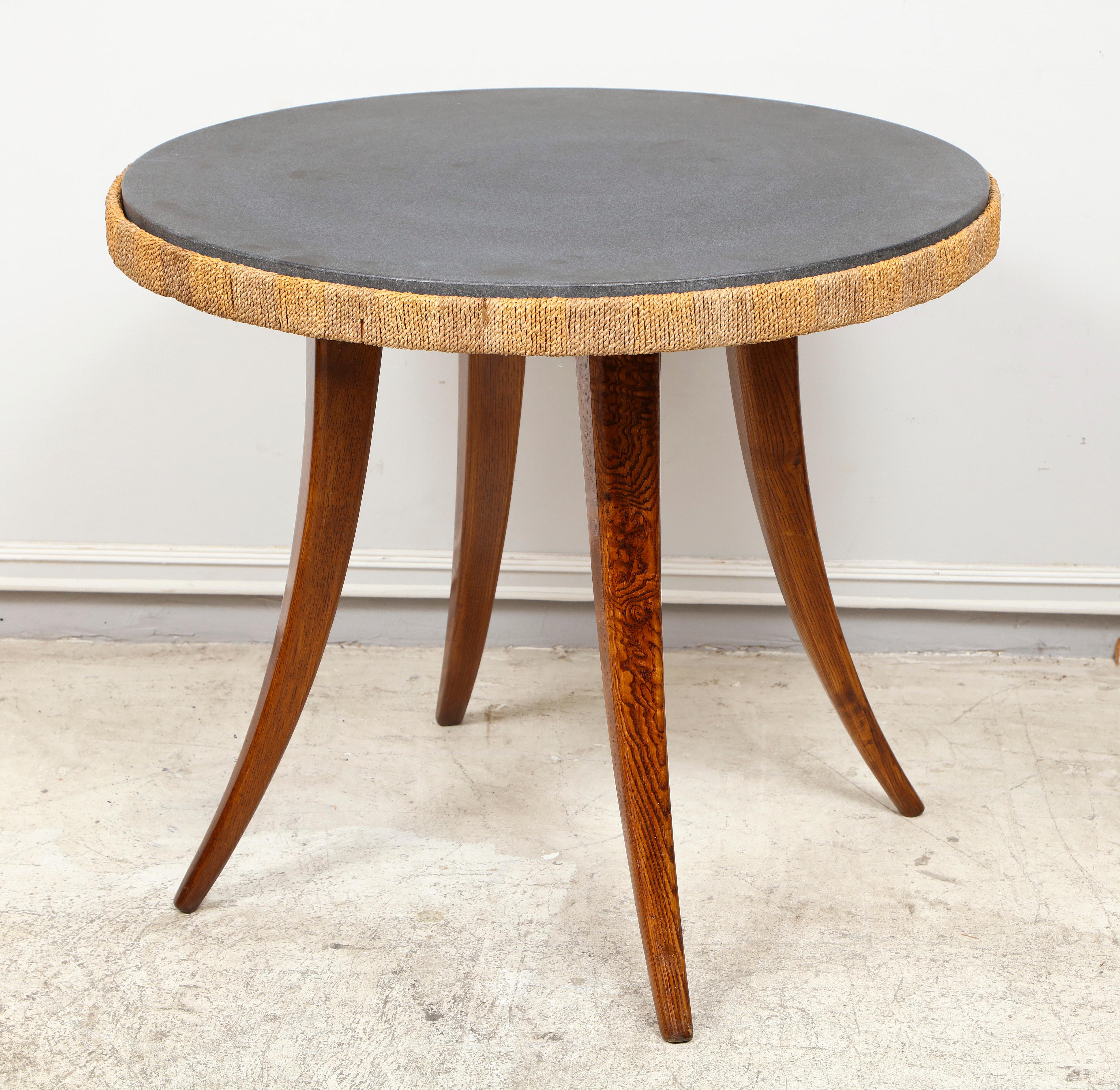 Unusual French 1940s marble-top table with Jute Apron on Stylized oak splayed legs.