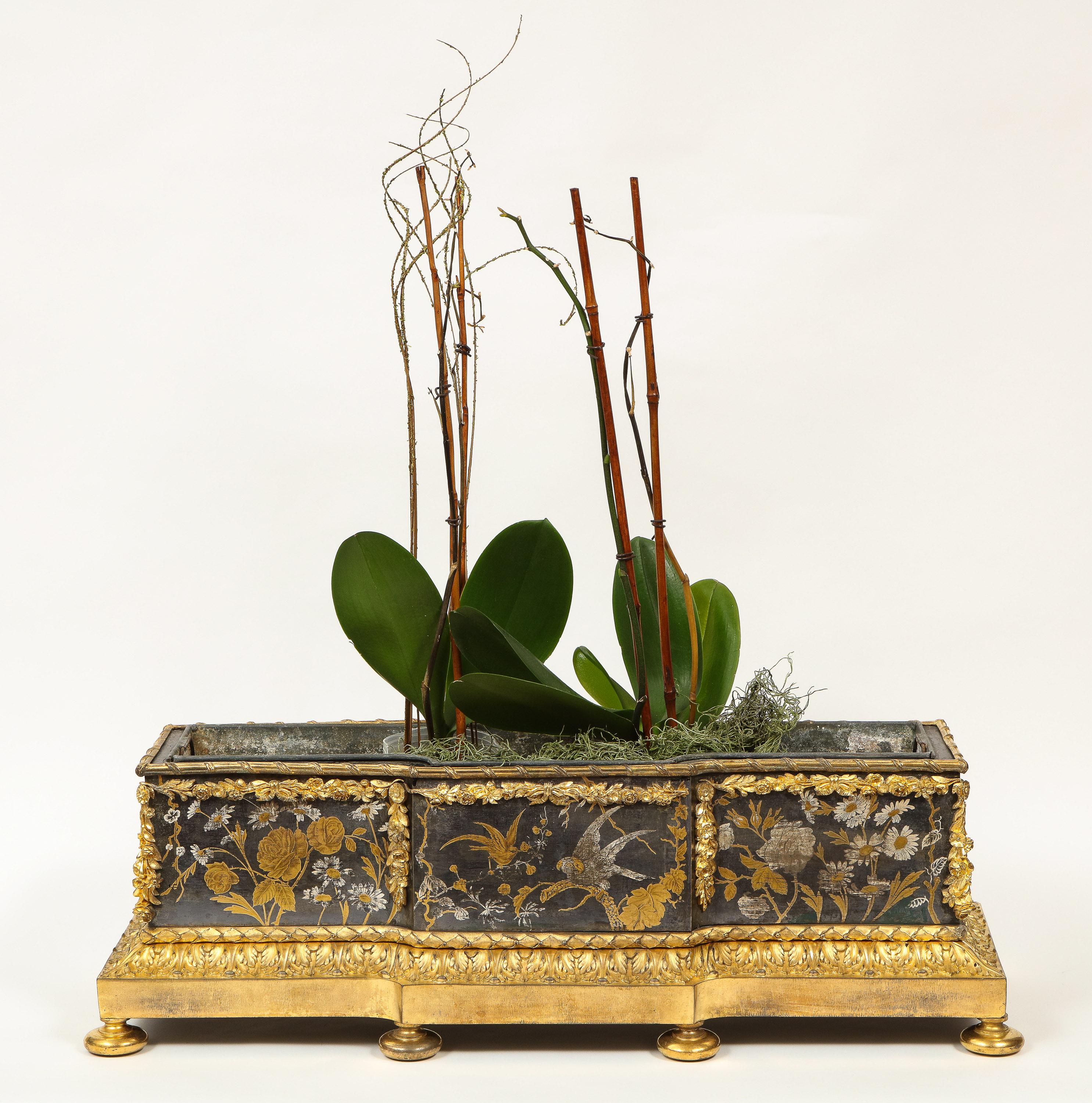 Unusual French Japonisme ormolu-mounted tole jardinière, circa 1870.

Very nice and unusual rectangular jardinière / planter made from the best quality ormolu. Designed with flowers, and birds, in the style of Christofle. 

Original liner