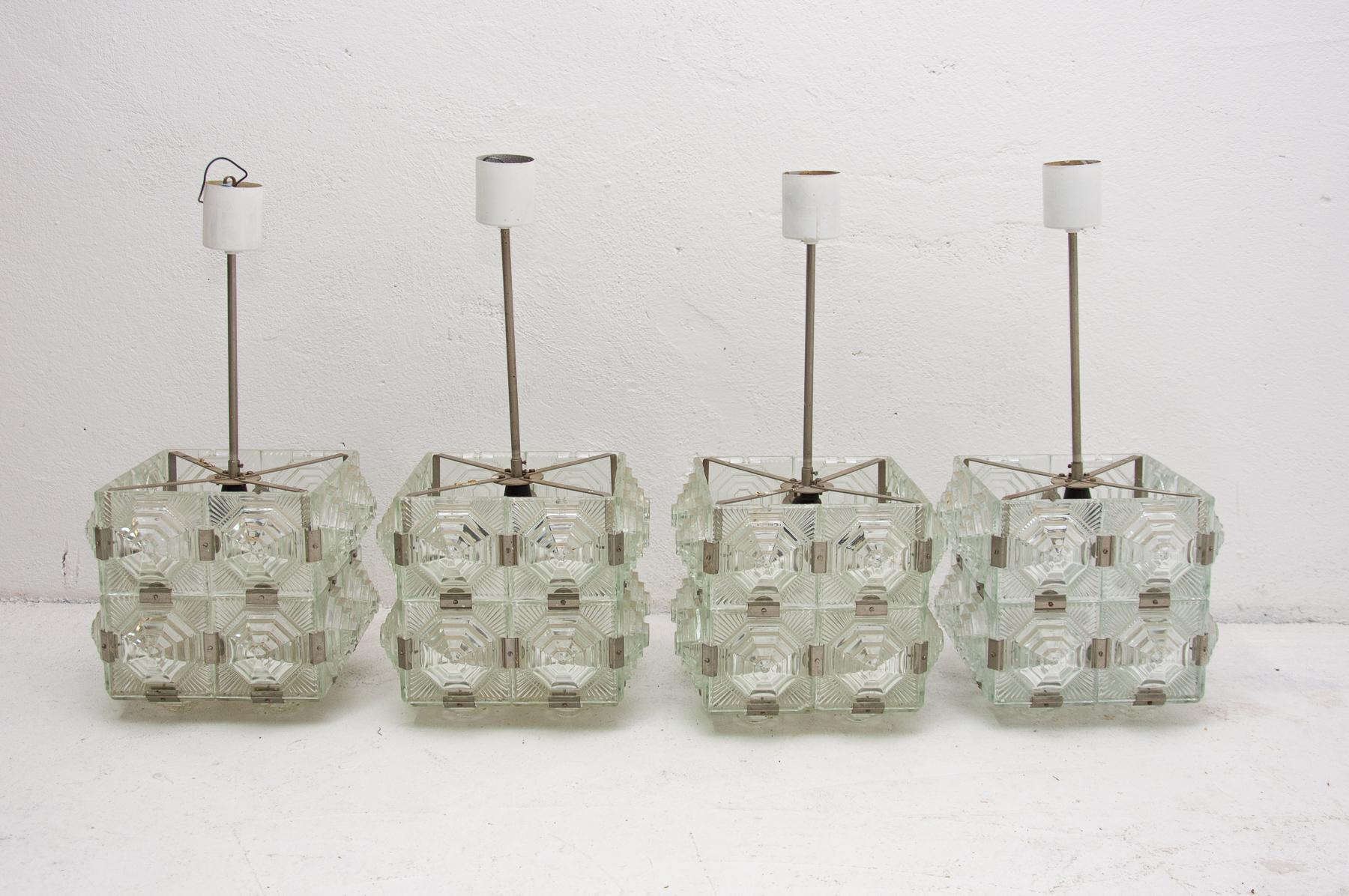 This is a rare model of the famous Kamenický Šenov glass cube hanging lamp from the 1970’s. Made in the former Czechoslovakia.

Unlike its better-known and more common version, this model has bulging glass on all sides of its perimeter.
Lamp is