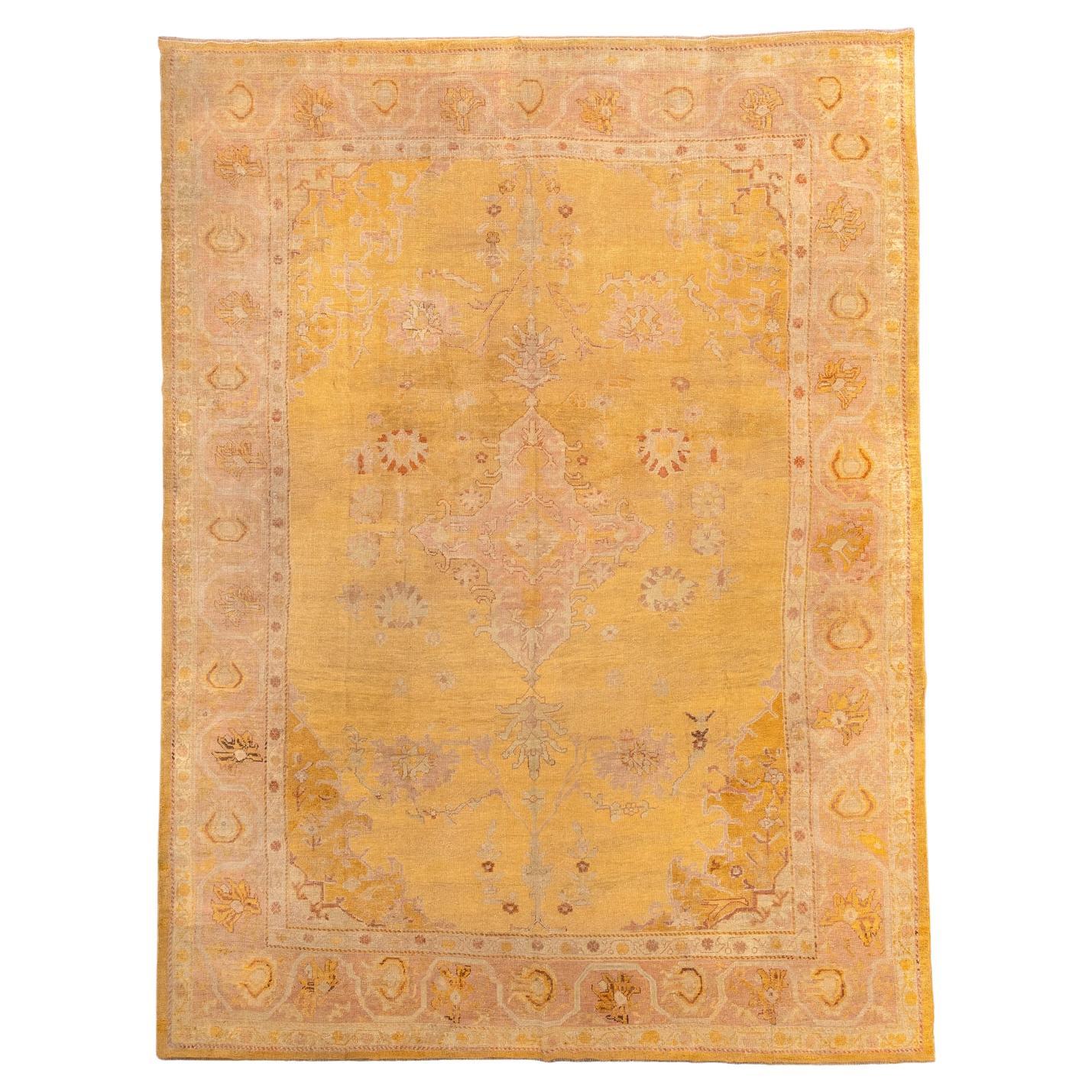 Unusual Gold Antique Oushak with Central Medallion