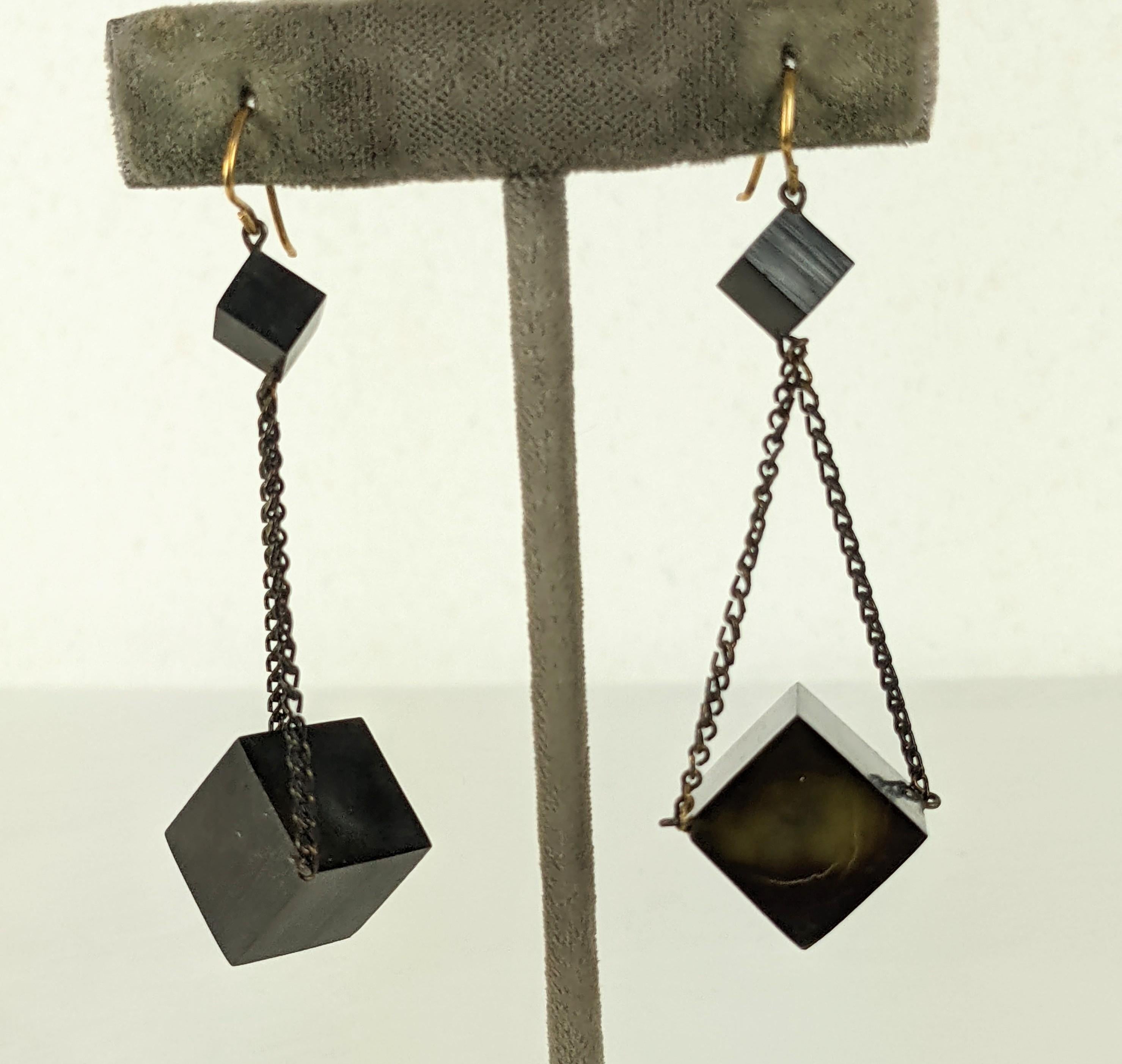 Unusual Gutta Percha Victorian Geometric Earrings from the 19th Century. Extremely Modern in design but created in the late 1800's. 2 cubes of gutta percha of different sizes are simply suspended from a blackened chain. The gold filled ear wires are