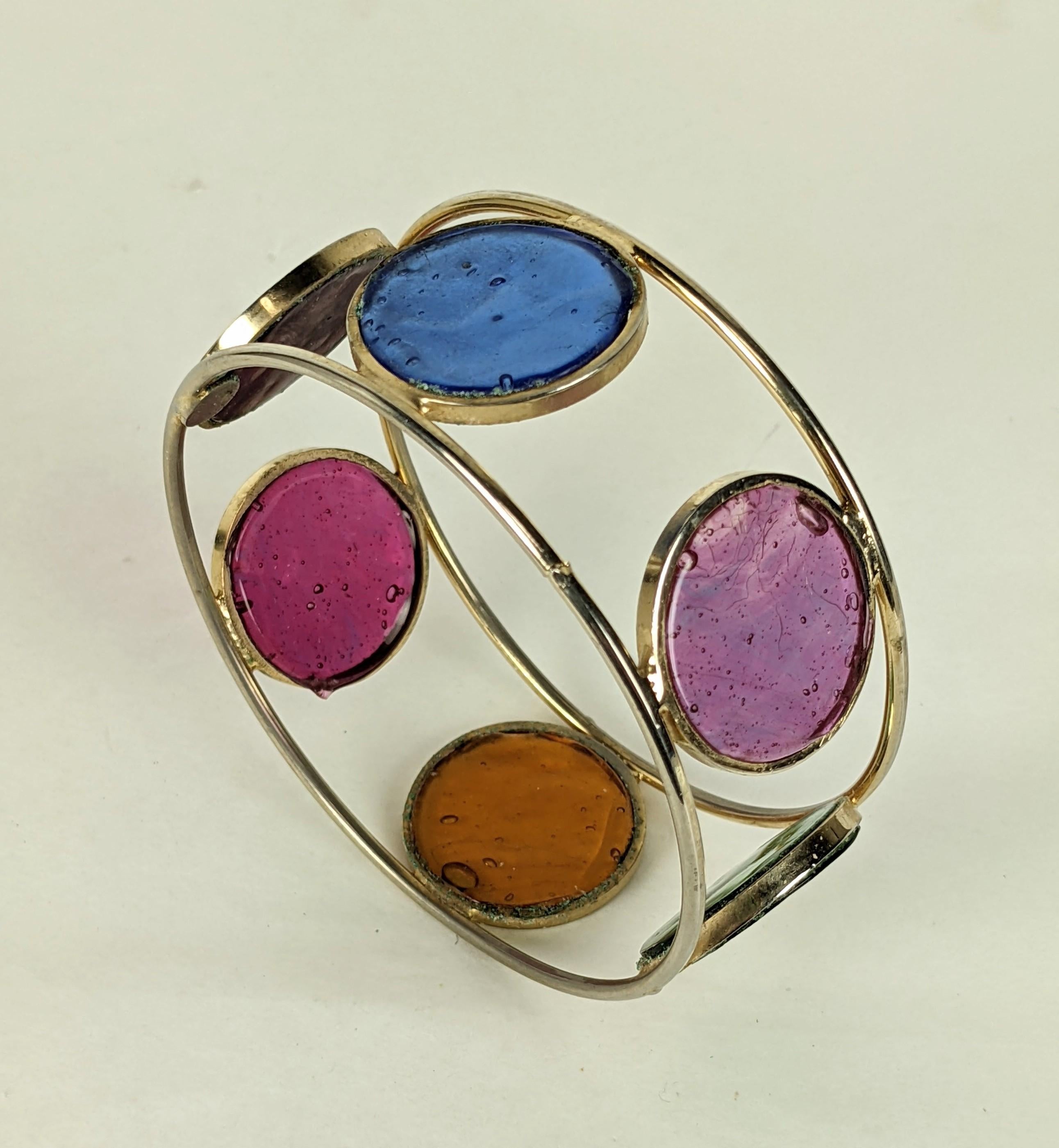 Rare Hattie Carnegie Poured Glass Bangle made by Gripoix in the 1960's. HC used different factories domestically and abroad and was one of the few to work with the Masion Gripoix in Paris. 
It is marked 