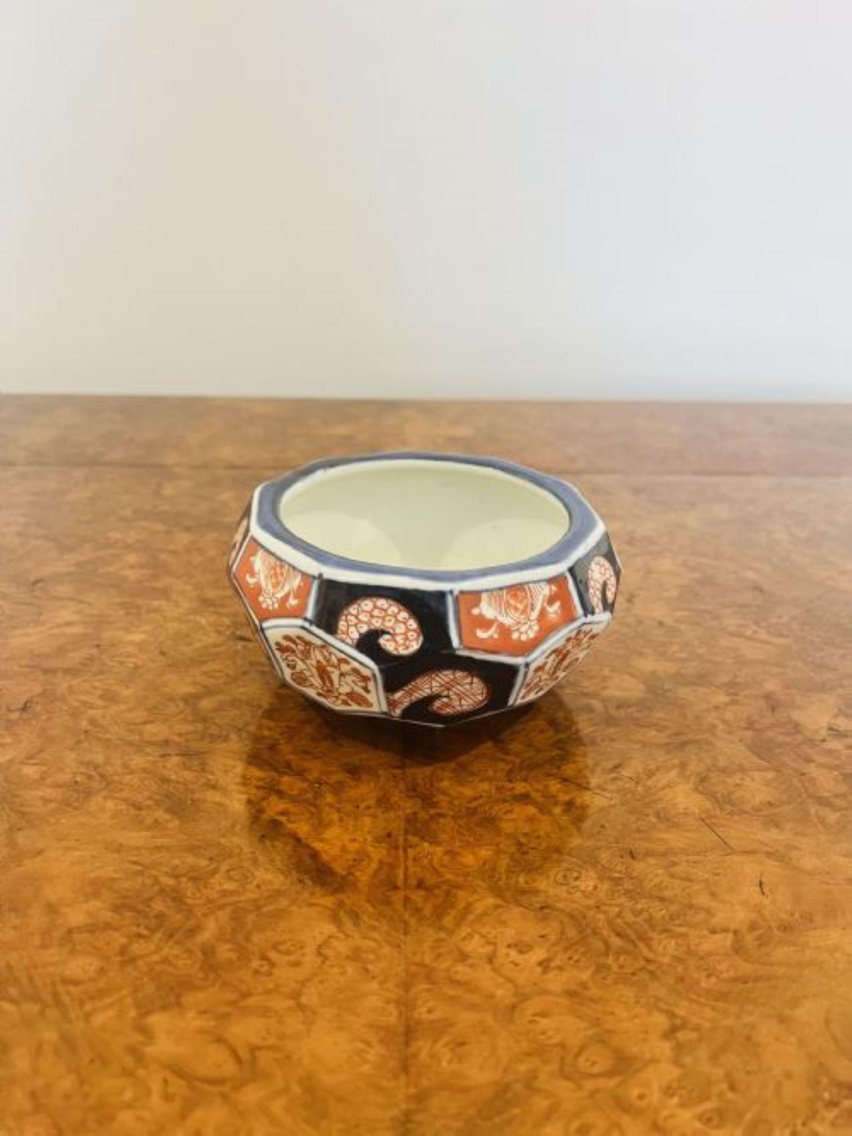 Unusual hexagonal shaped antique Japanese Imari bowl having an unusual hexagonal shaped Imari bowl with red, blue and white coloured hand painted decorated panels, wonderful decoration to the centre of the bowl with flowers, leaves and insects.
