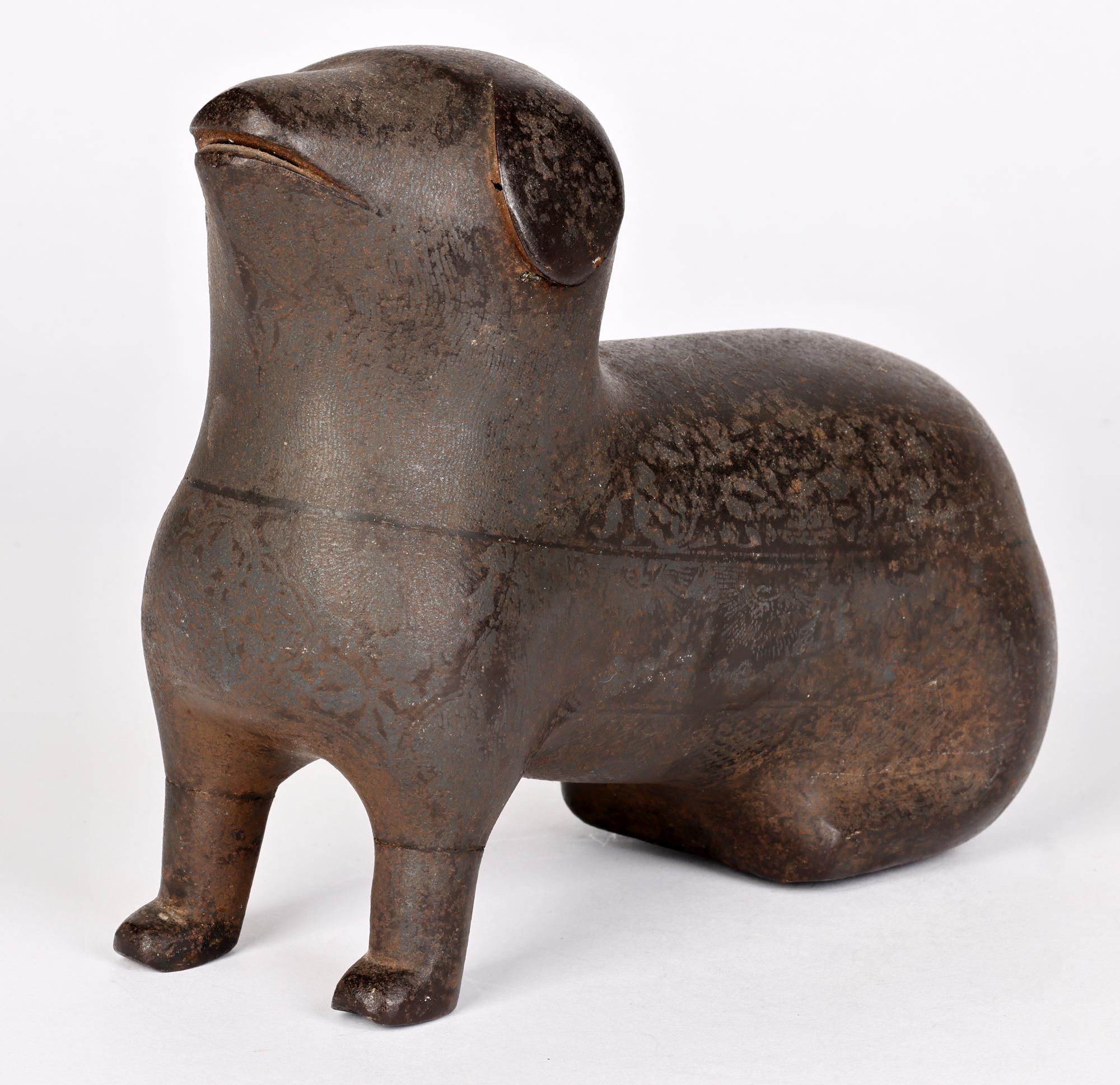 Early 20th Century Unusual Indian Khond Attributed Stylized Patinated Metal Seated Dog Figure For Sale